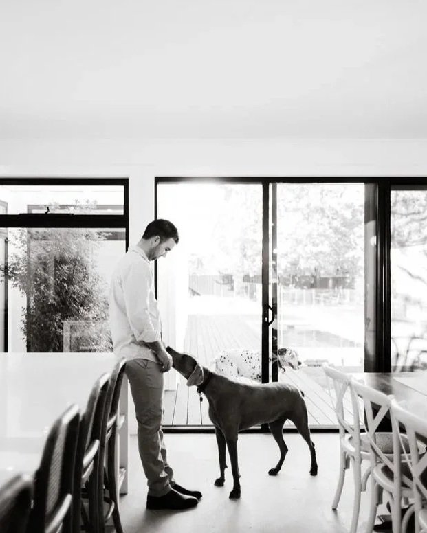 Builder and dog standing in completed Mildura renovation