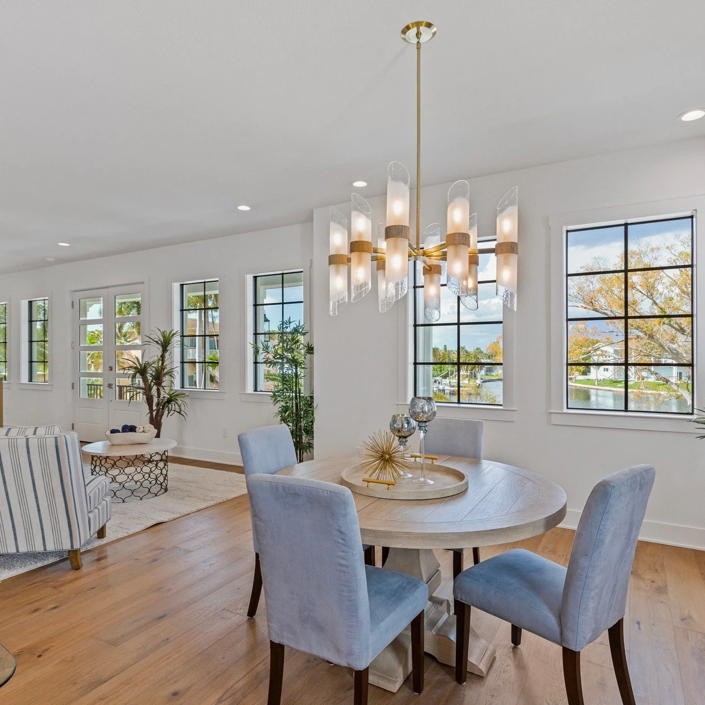 ✨ Now fully staged and move-in ready.

Welcome to 220 90th Ave NE in Riviera Bay &mdash; a newly completed, elevated waterfront residence designed for both everyday living and effortless entertaining.

Natural light pours through oversized windows, h