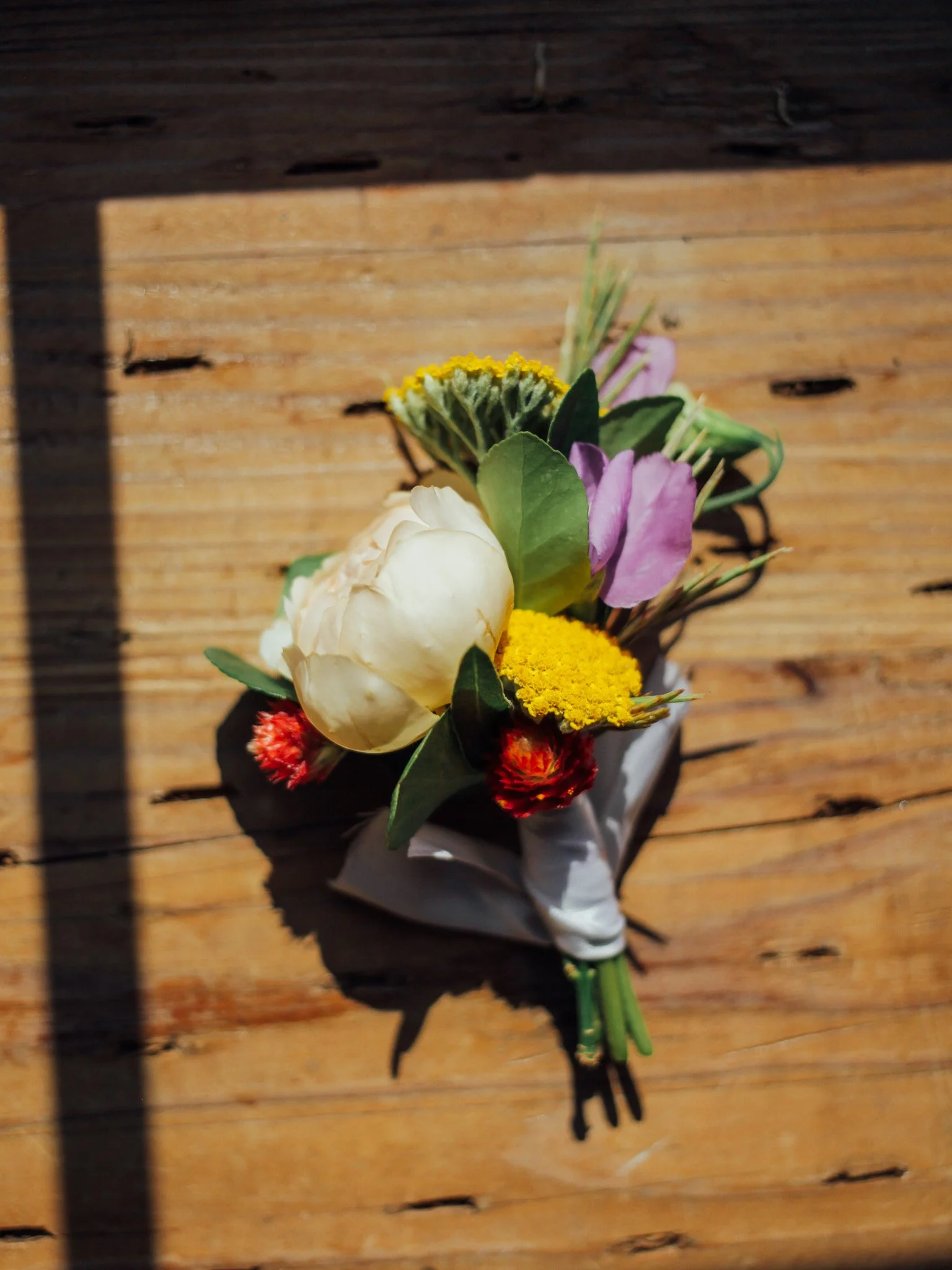 early_july_boot_farmette_flowers_wedding.jpg