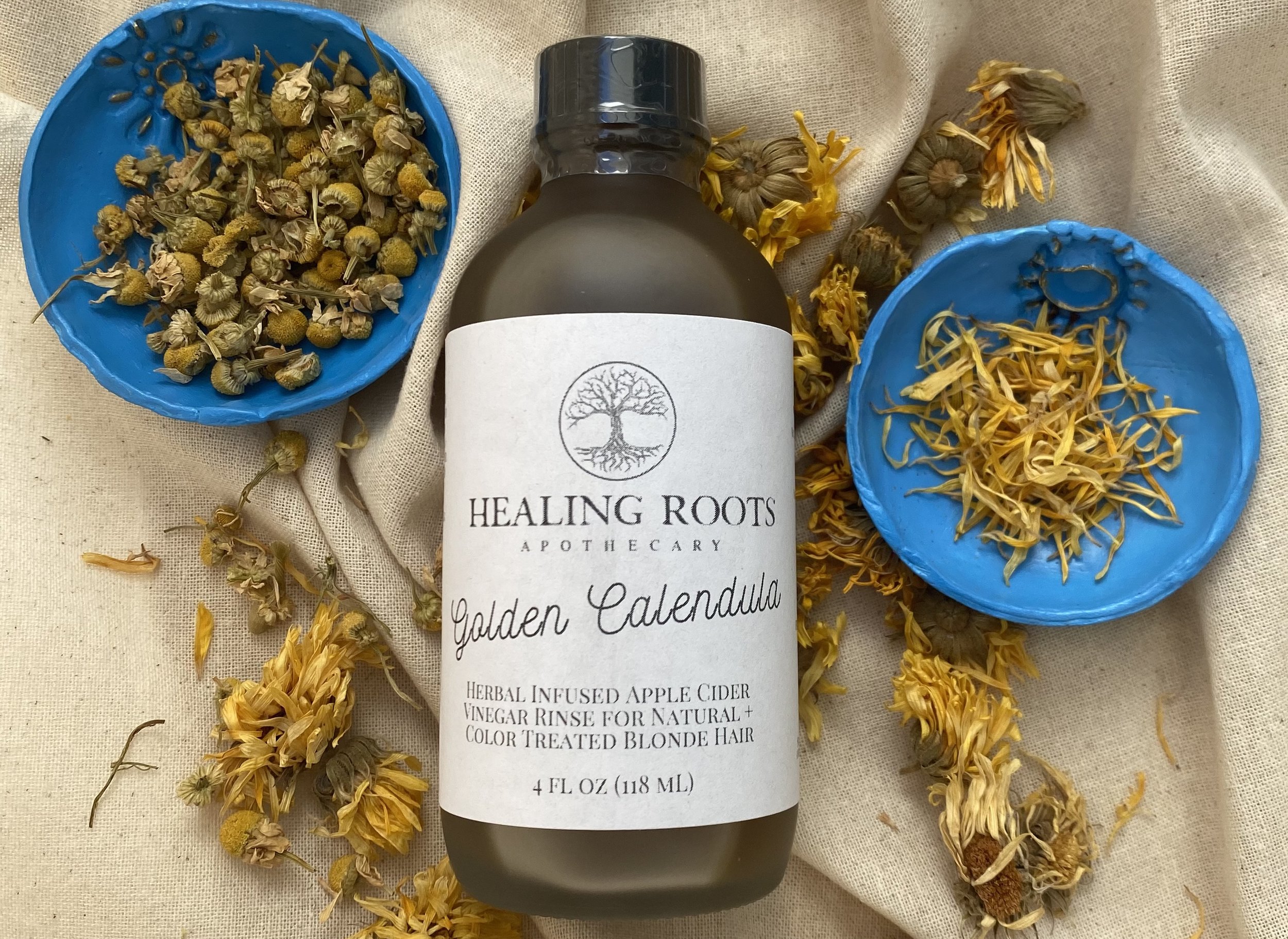 Golden calendula herbal infused apple cider vinegar hair rinse for natural + color treated blonde hair.