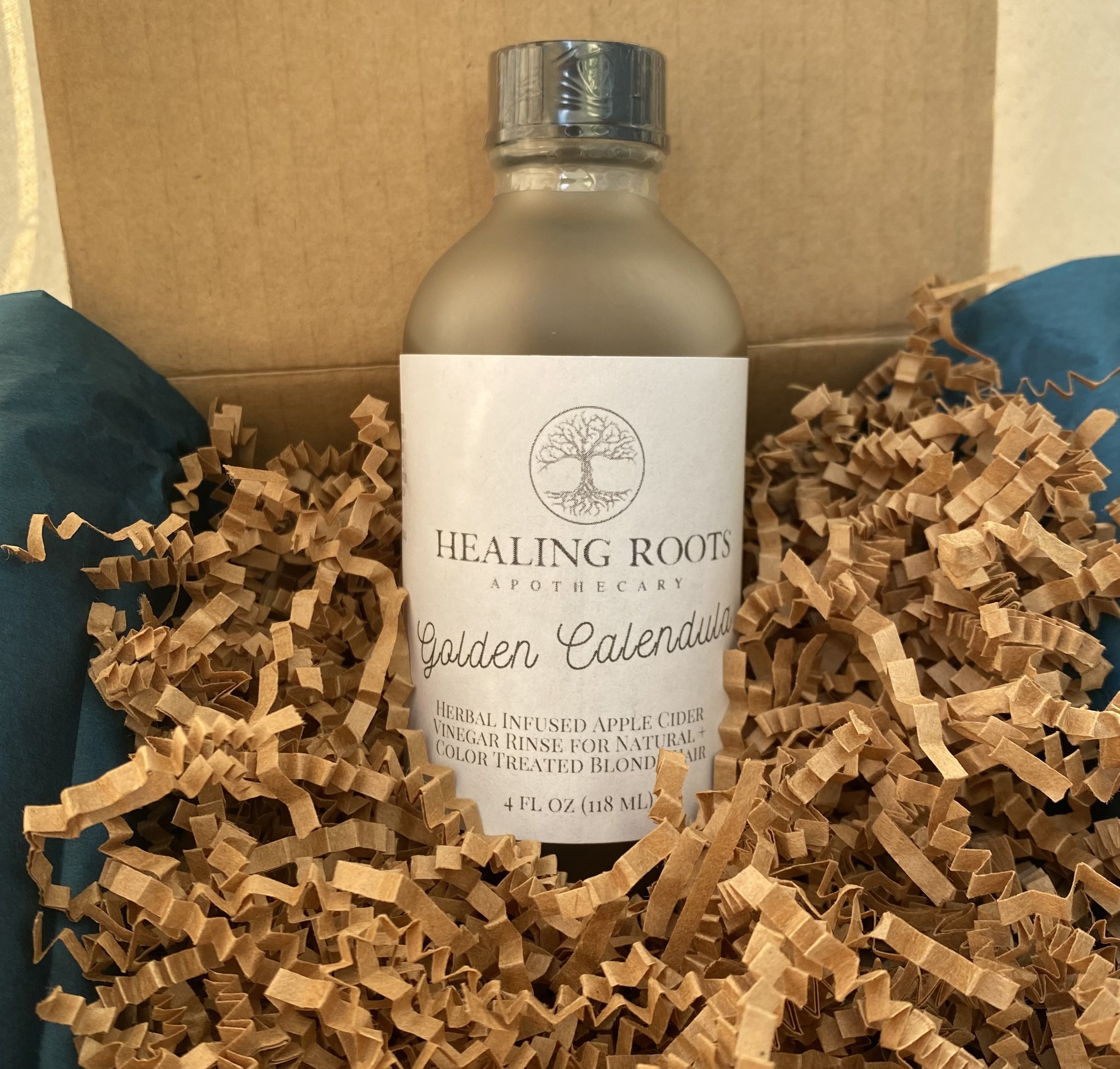 Rinses are delicately nestled in natural brown crinkle spring paper for safe shipping to its final destination.