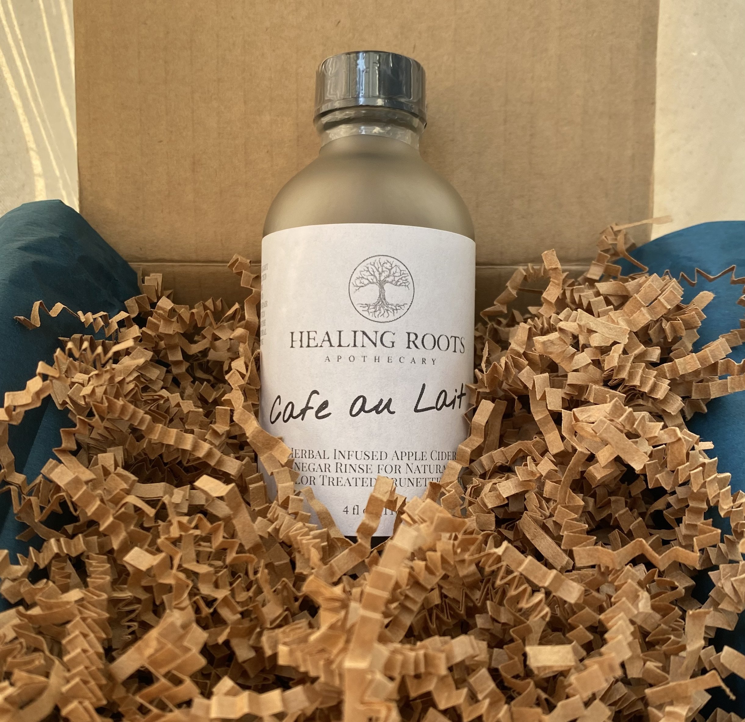 Rinses are delicately nestled in natural brown crinkle spring paper for safe shipping to its final destination.