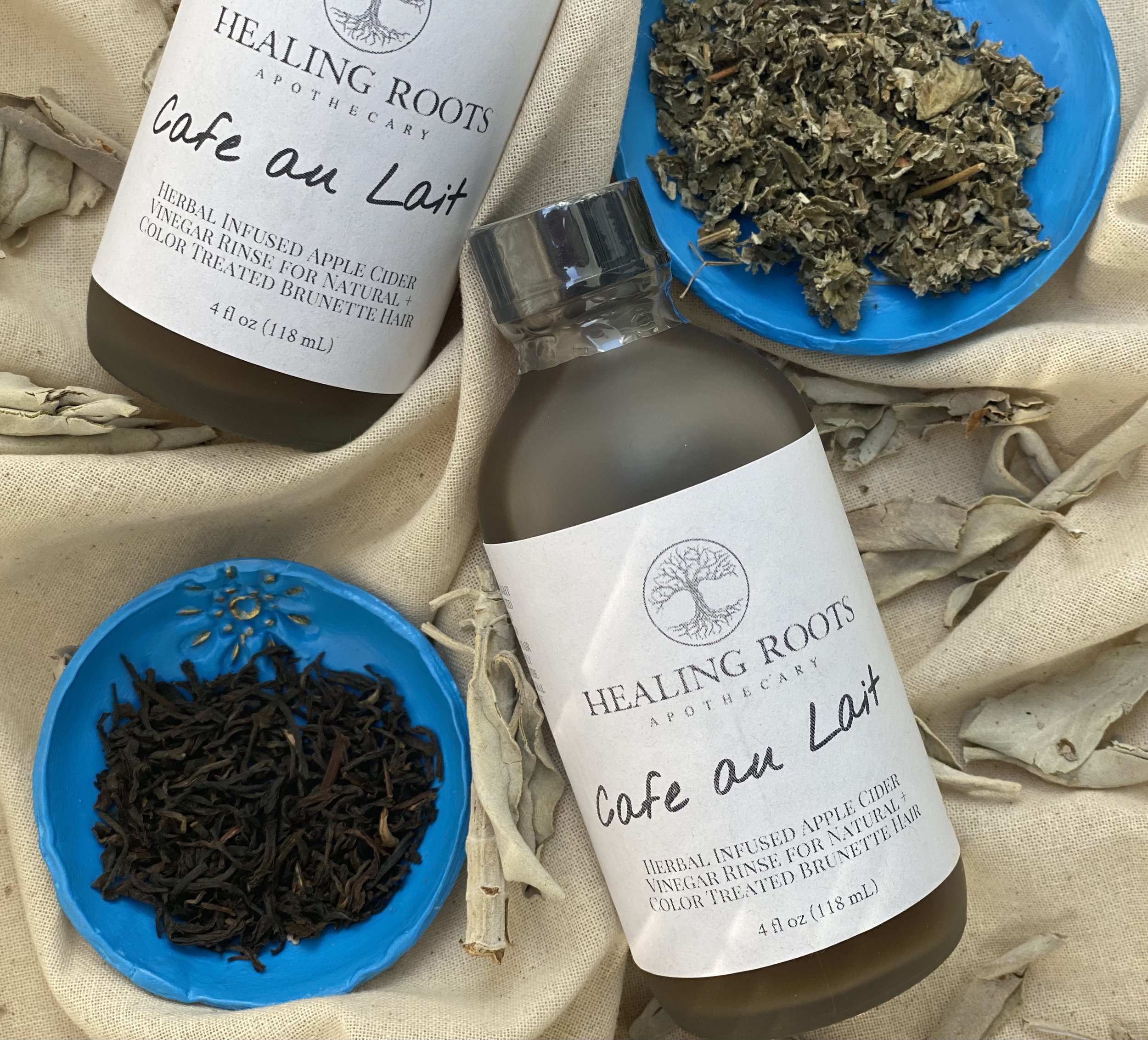 Cafe au lait herbal infused apple cider vinegar hair rinse for natural + color treated brunette hair.