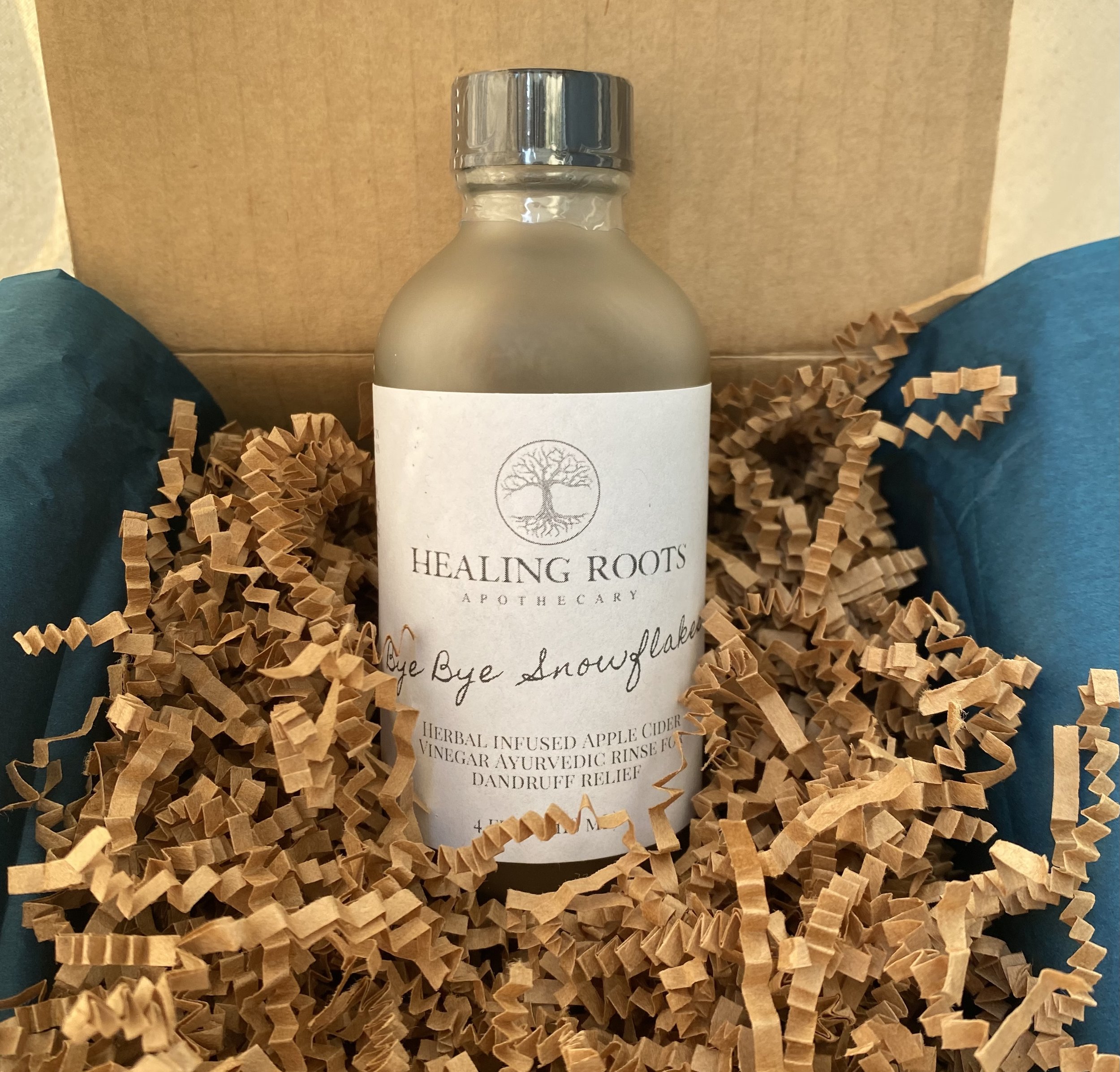 Rinses are delicately nestled in natural brown crinkle spring paper for safe shipping to its final destination.
