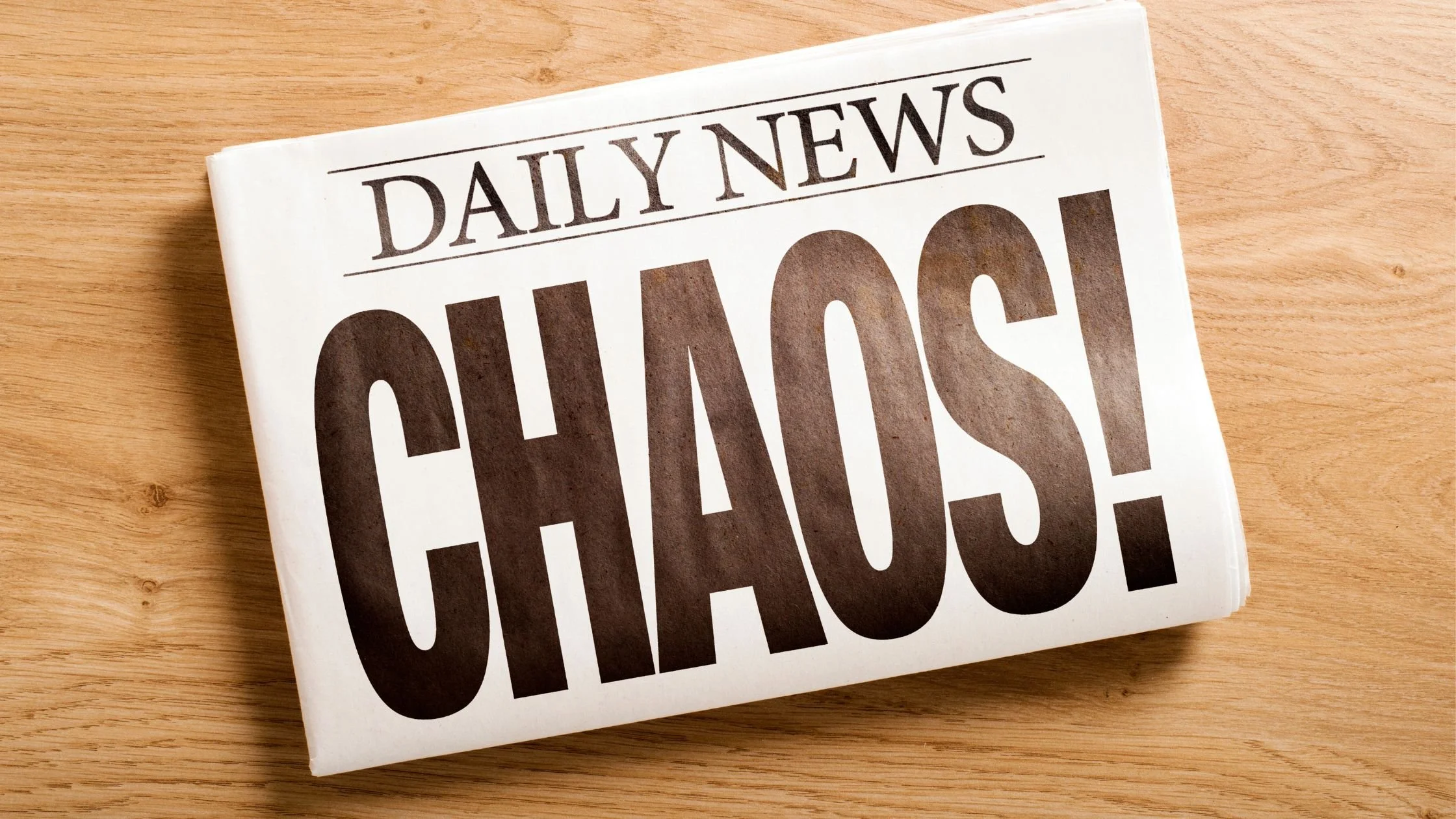Newspaper front page that reads Daily News Chaos!