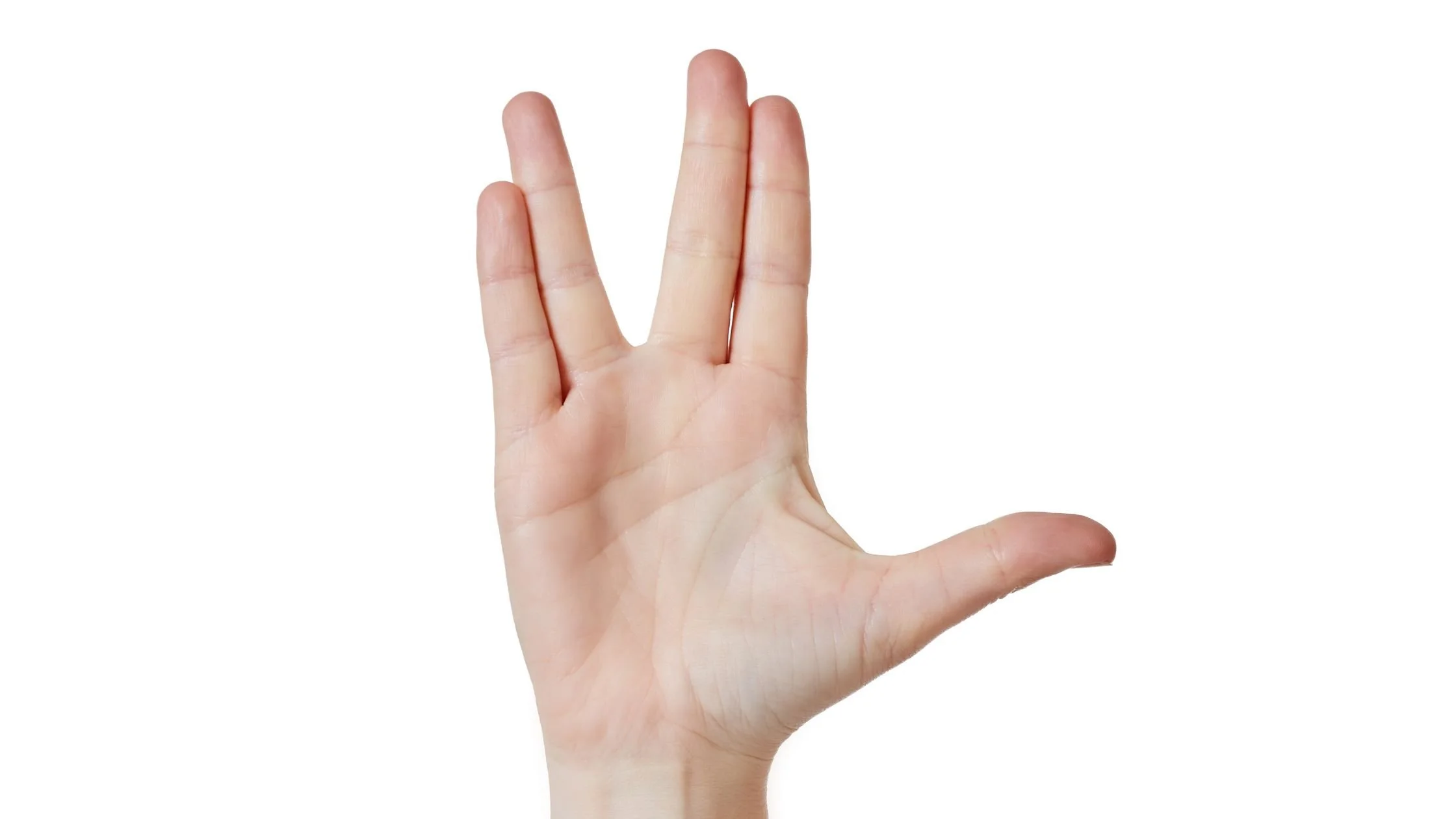 Hand making the Vulcan sign from Star Trek, pointer and middle fingers together and pinkie and ring fingers together