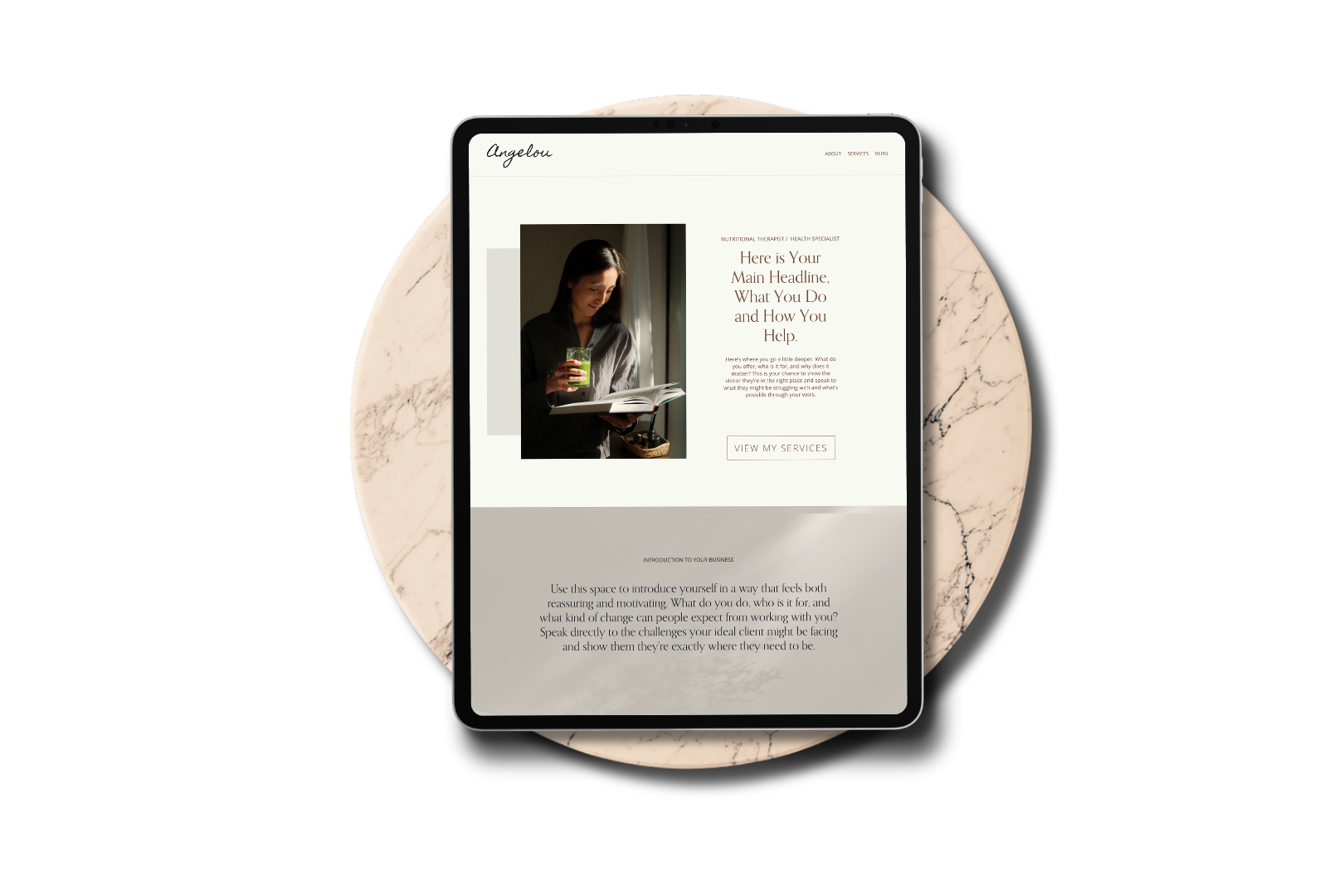 Home page of Angelou website template on a tablet screen