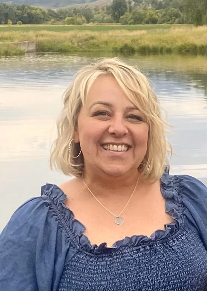 Picture of Therapist Amy Seamons with pond in background