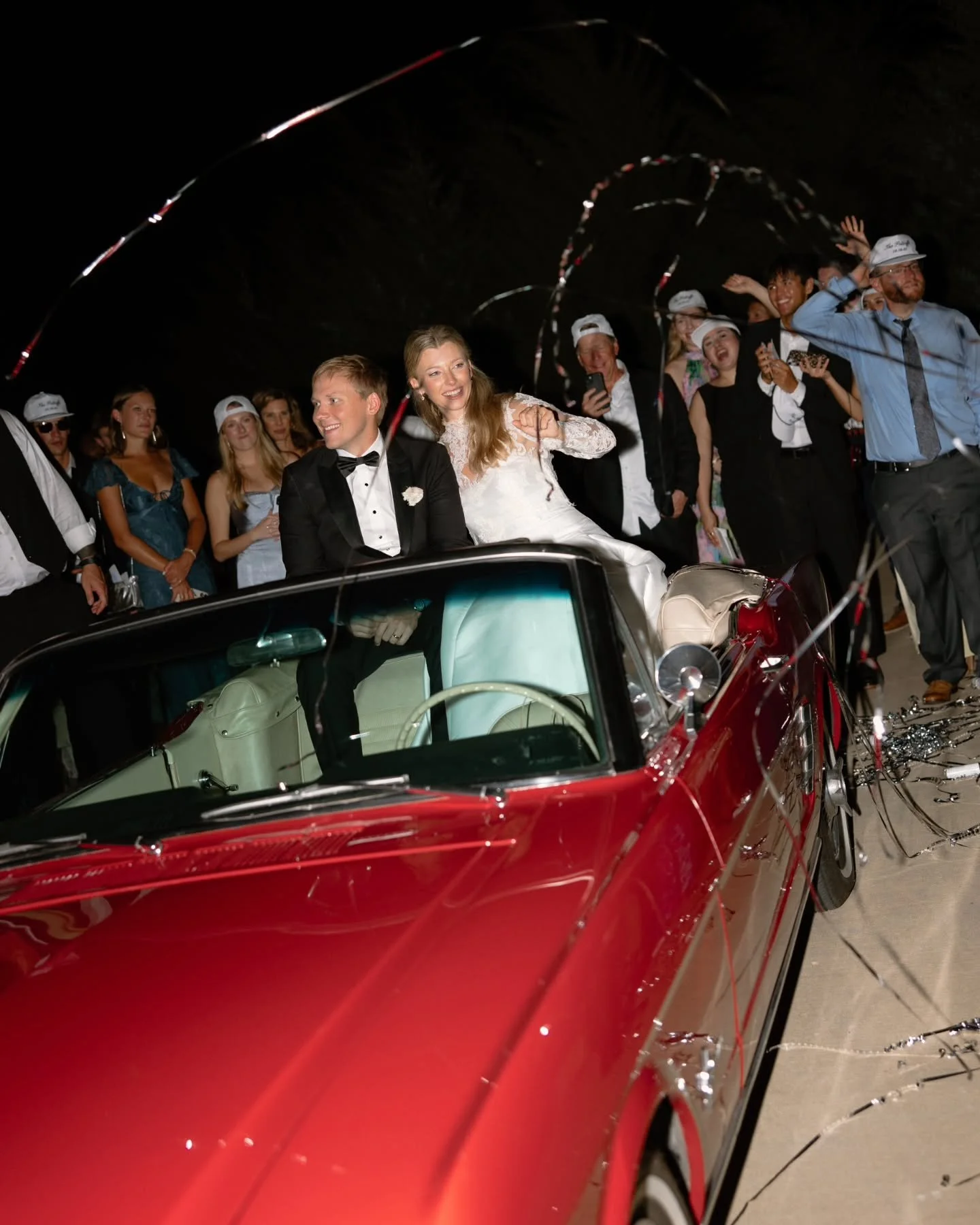 Congrats to the new Pottroff's! 🎉 🎊 Together, they concluded the night with a grand exit in our beautiful red 1966 Ford Mustang convertible. Book for yourself at the link in our bio!

Photos by: @laurenleighwhicker 

#pegasuscollection