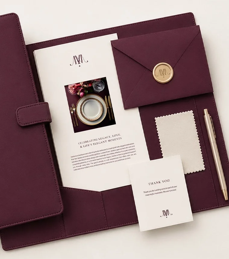 Marlev wedding planning branding with burgundy stationery and ornamental brand emblem
