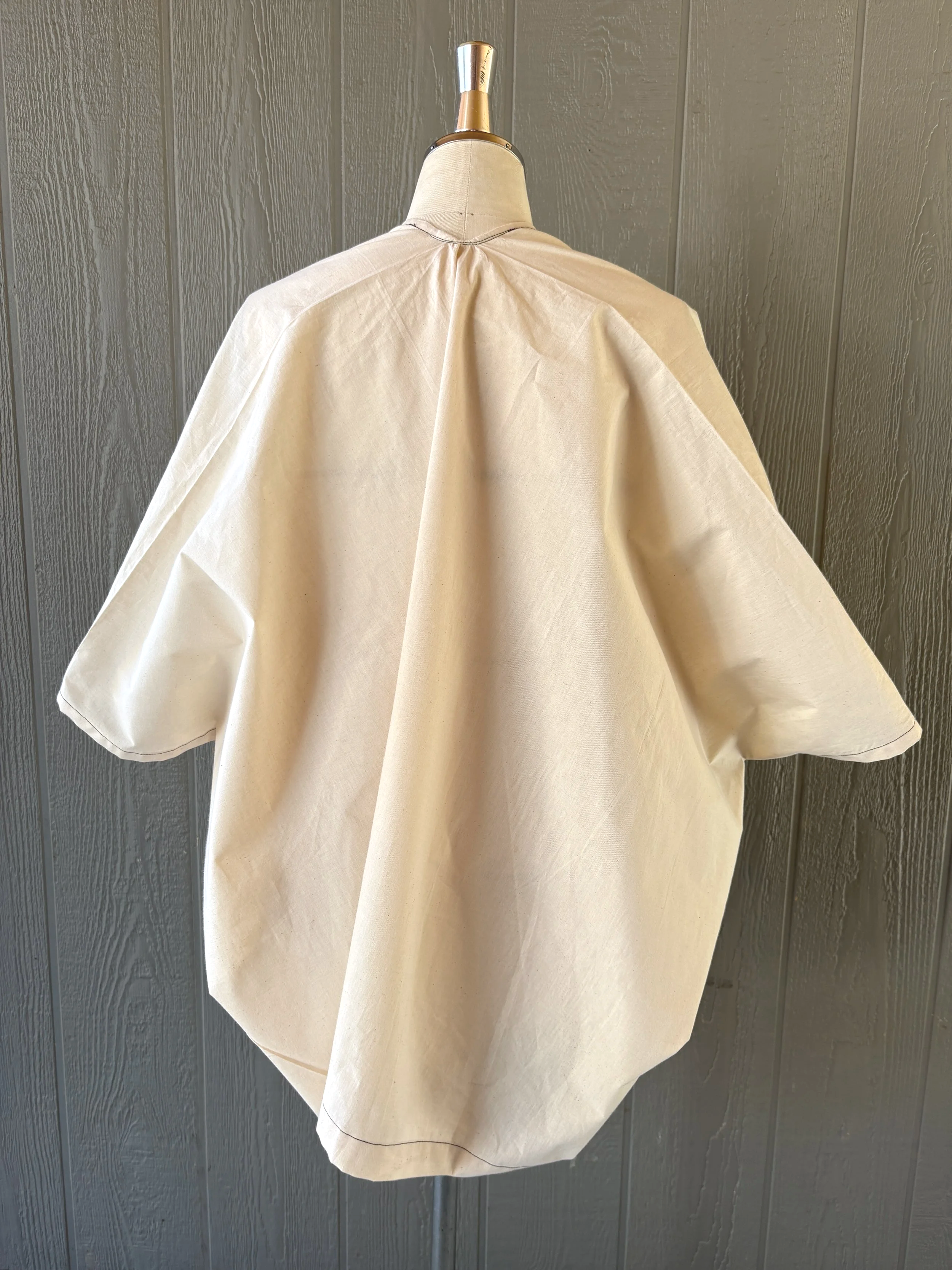 Finished kimono wrap cover-up in muslin, back view, showing the finished back neck and overall silhouette