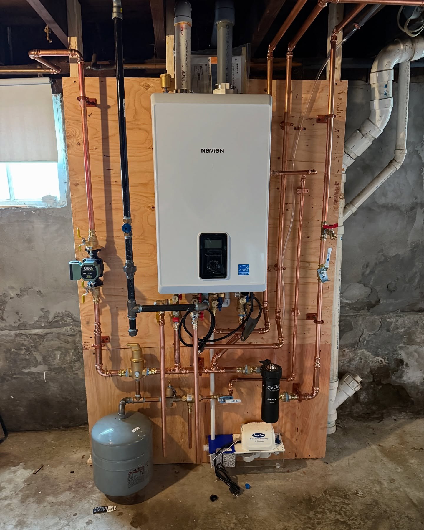 Specializing in Navien installs, this Navien combi unit is ready to tackle the customers heat and hot water needs with ease!