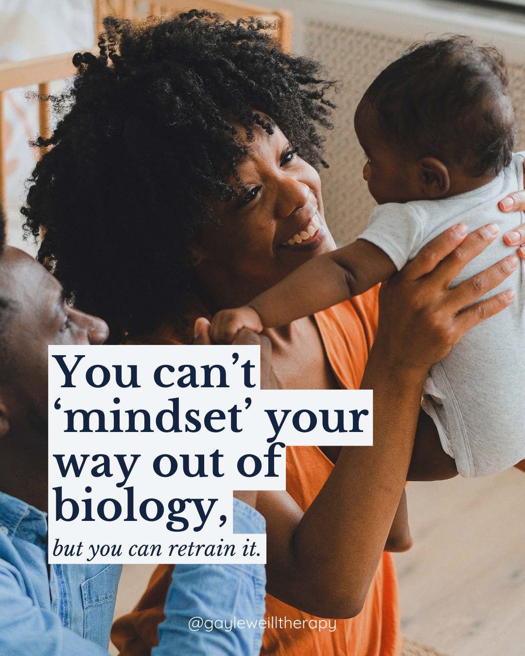 A woman lifts a smiling child, holding the child close while an older man looks on affectionately, with a quote about mindset and biology overlaid.