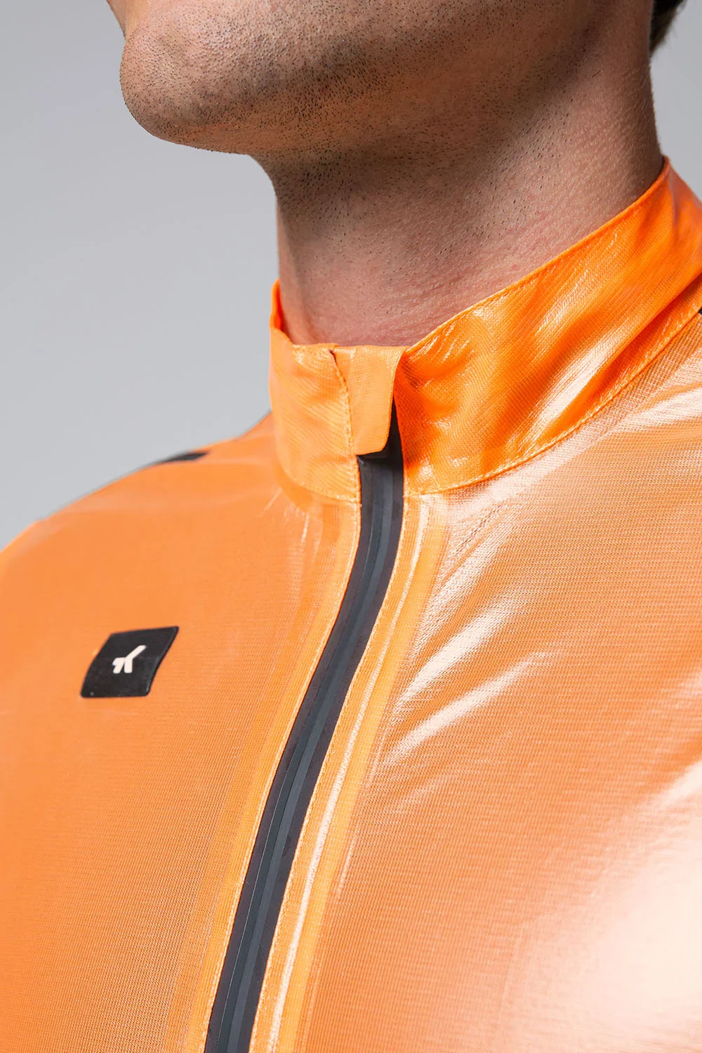 10-05-009-002-lightweight-rain-jacket-pluvia-2-0-unisex-blazing-orange-03_feb0dc21-86b0-4484-9bd9-ad904d70a788.webp