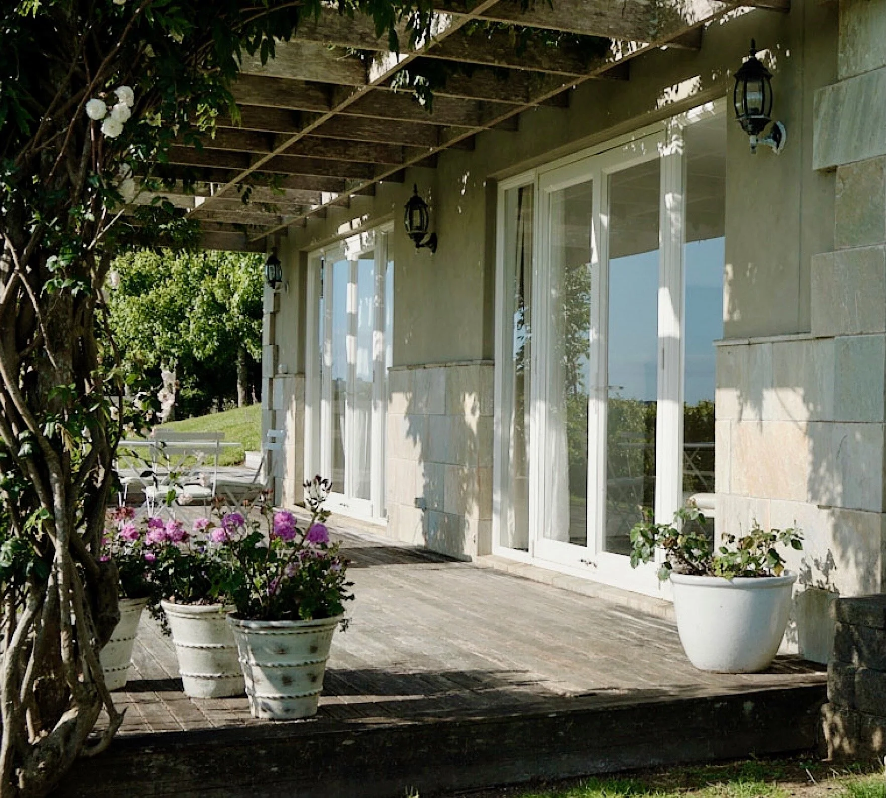 Living room and bedroom both open onto deck.jpeg