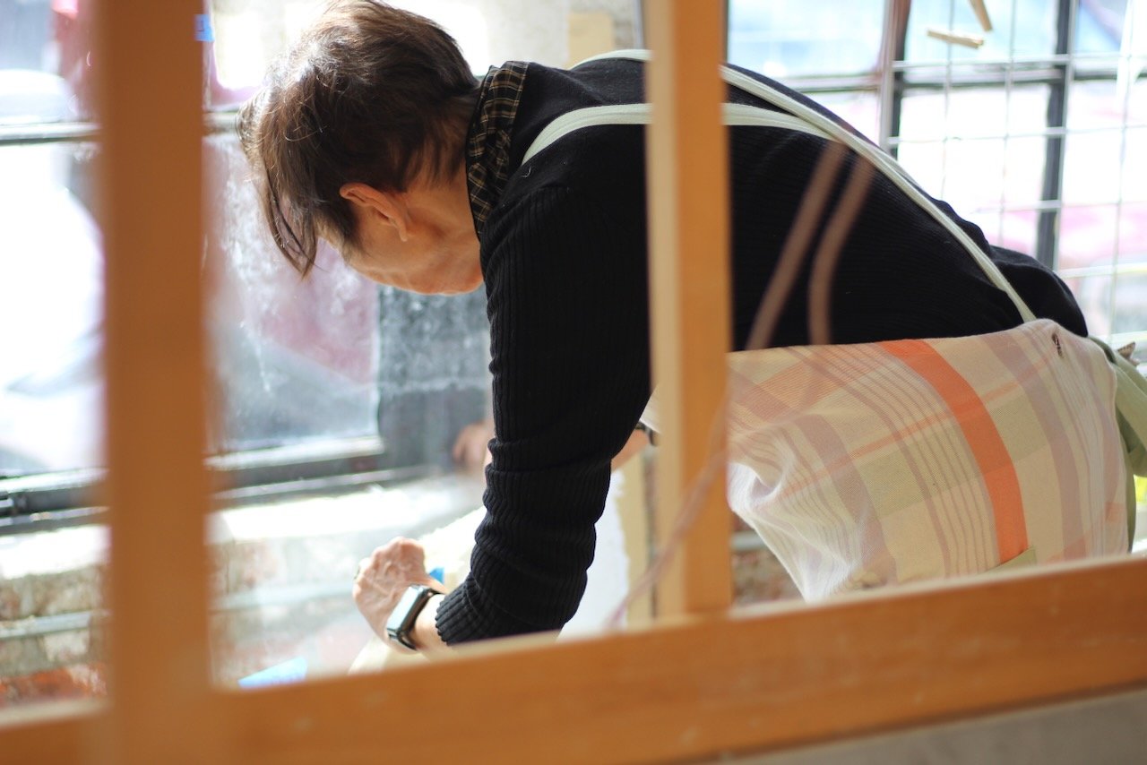 Ayako-sensei checking that the paper is dry