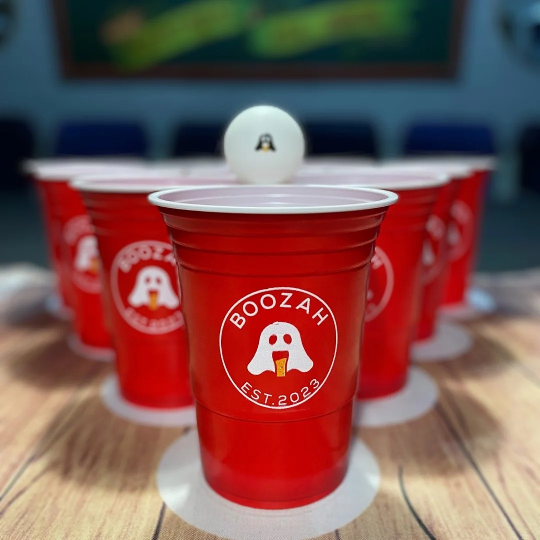 Boozah beer pong cups and beer pong balls