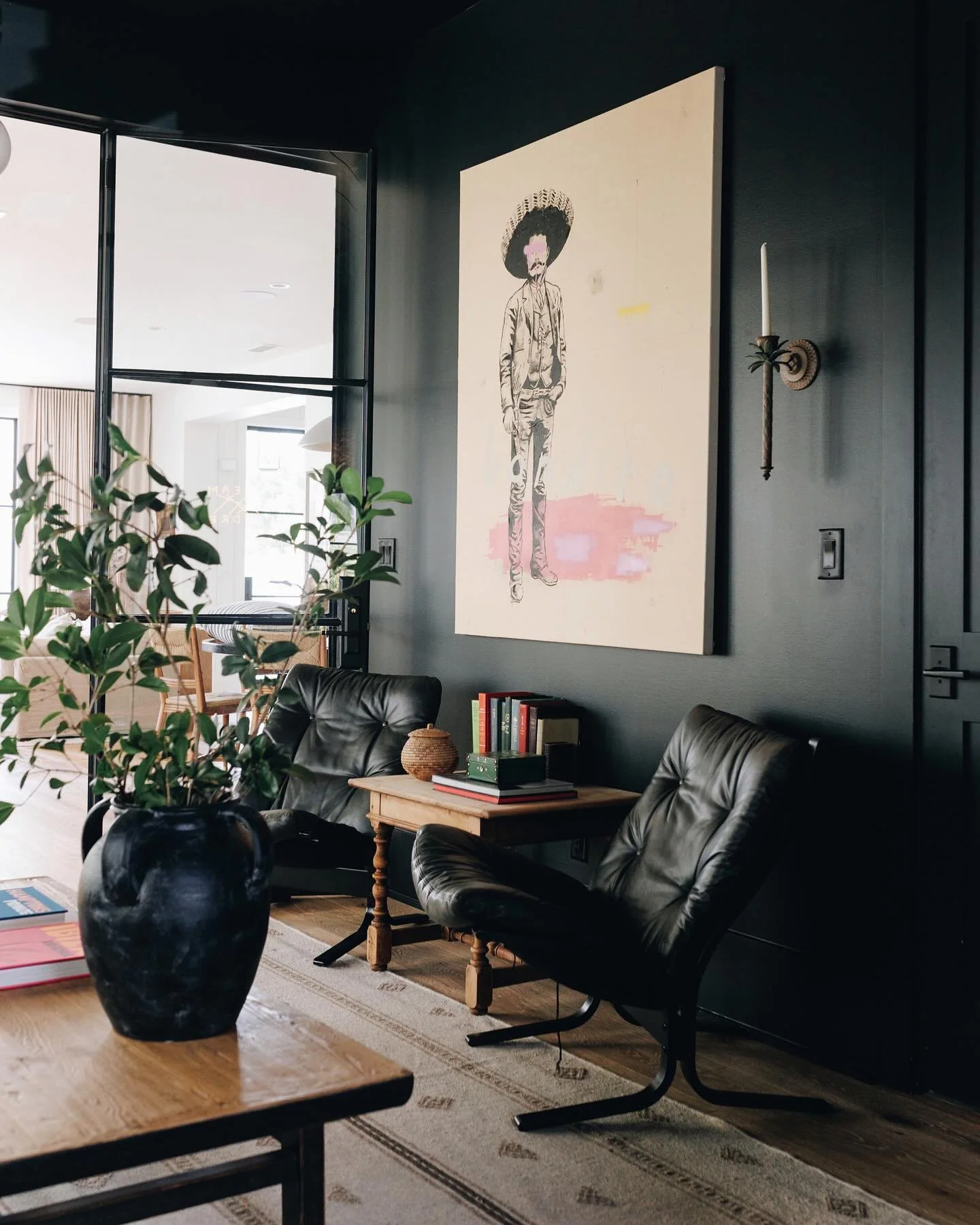 The leather chairs and the commissioned art piece were already part of the space before the design process began. I love it when I can incorporate existing elements, especially when they are as cool as this guy. 

#shannoncoledesign