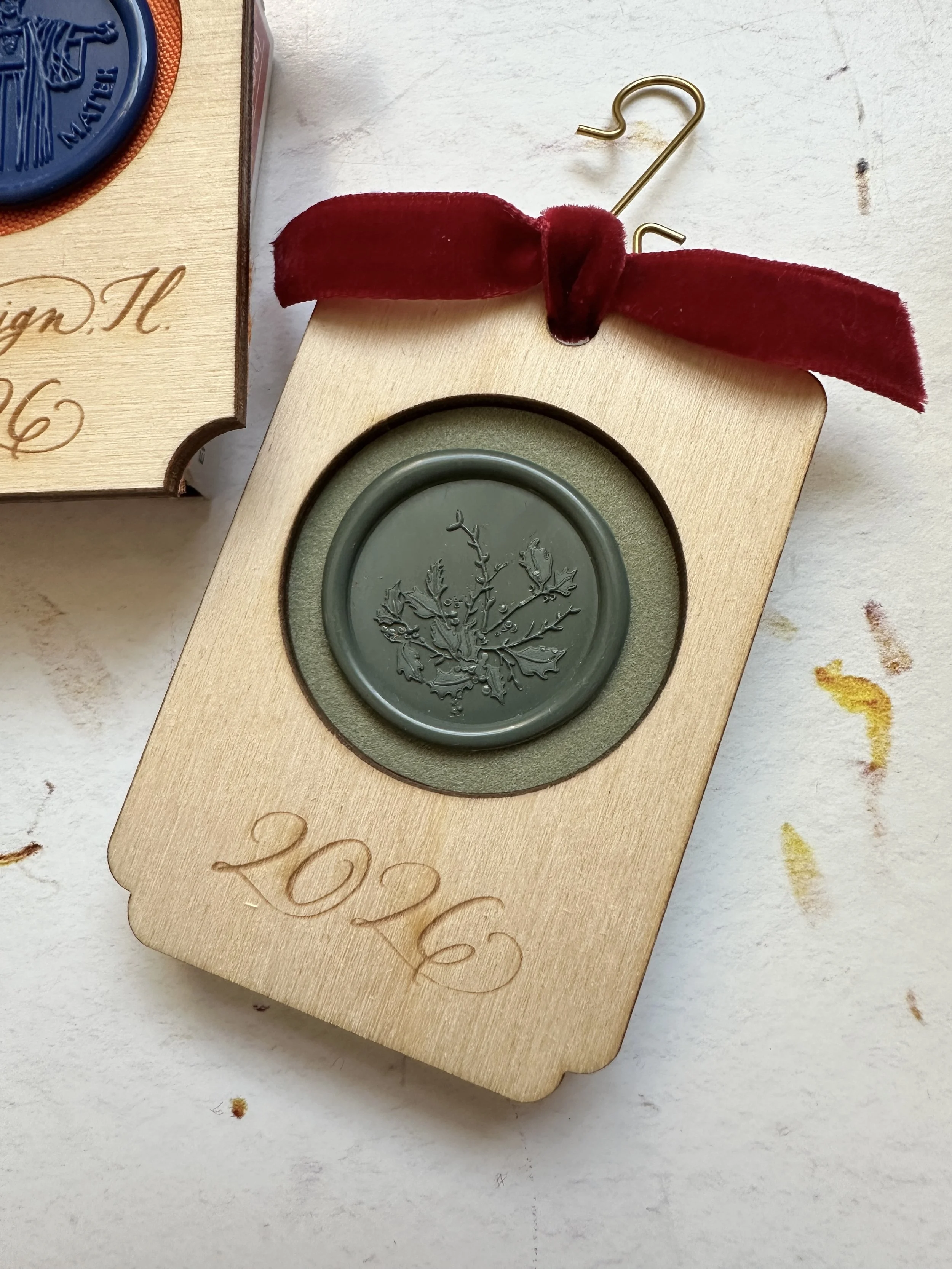 2026 handmade personalized ornament with green botanical wax seal