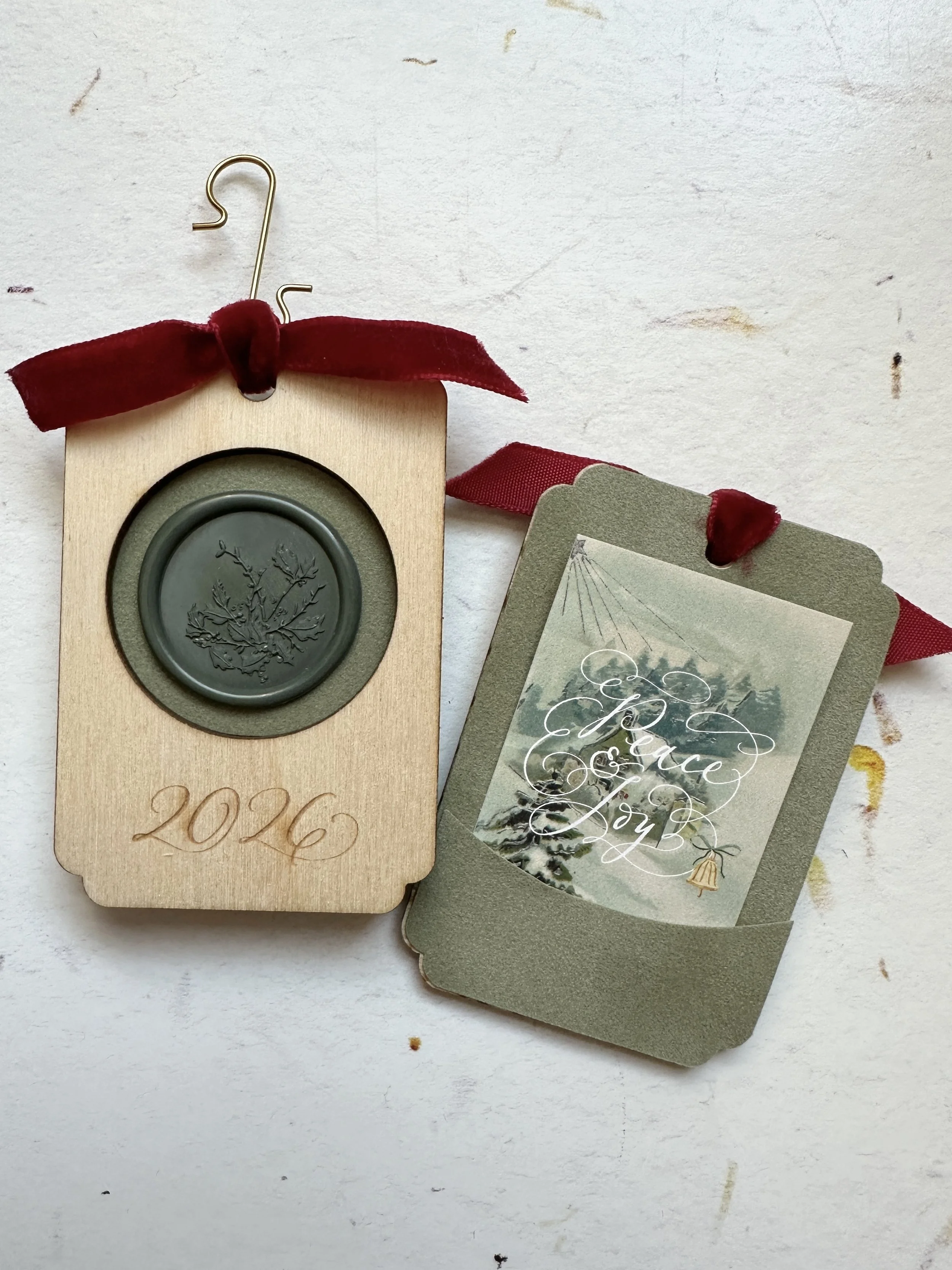 2026 handmade personalized ornament with green botanical wax seal and peace on earth art print