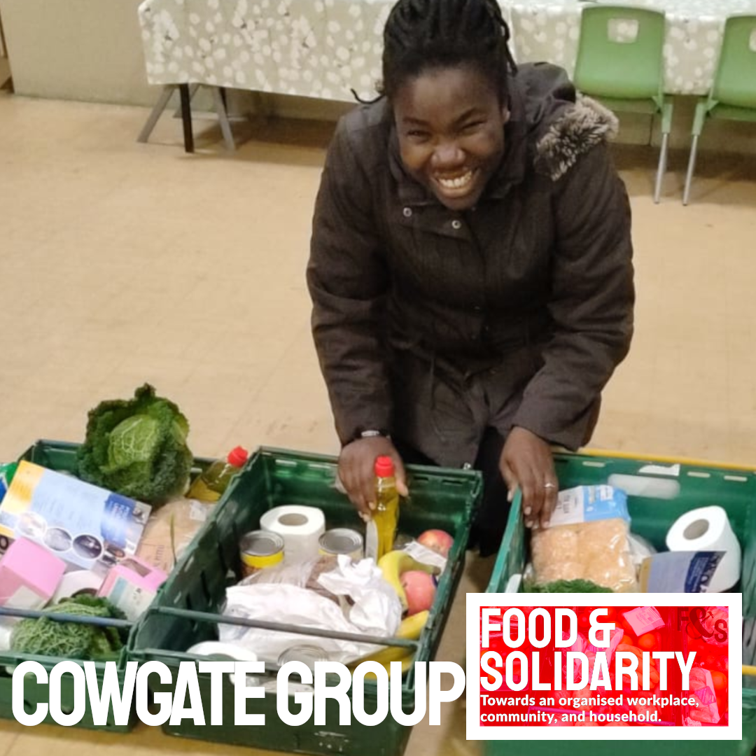 Food & Solidarity Cowgate volunteers with solidarity banner