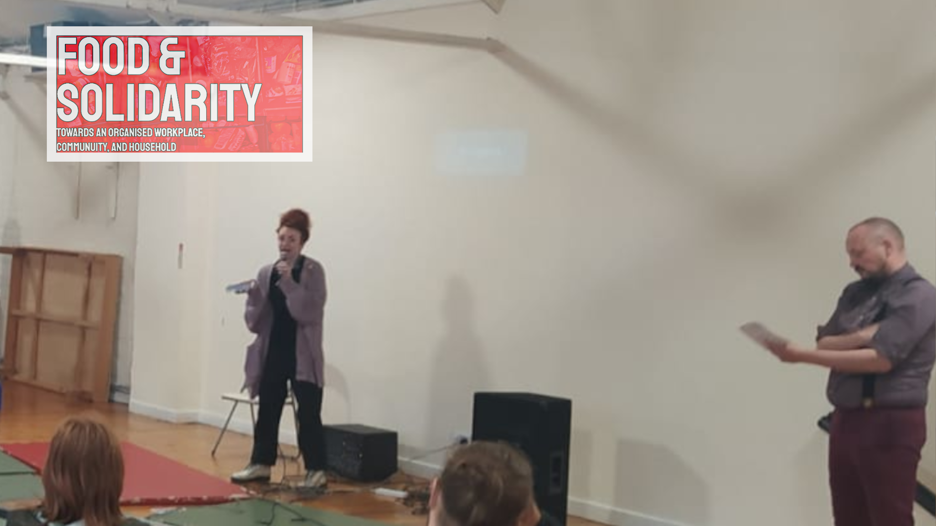 Don't Pay UK campaign organizers presenting energy bill resistance strategy at community meeting