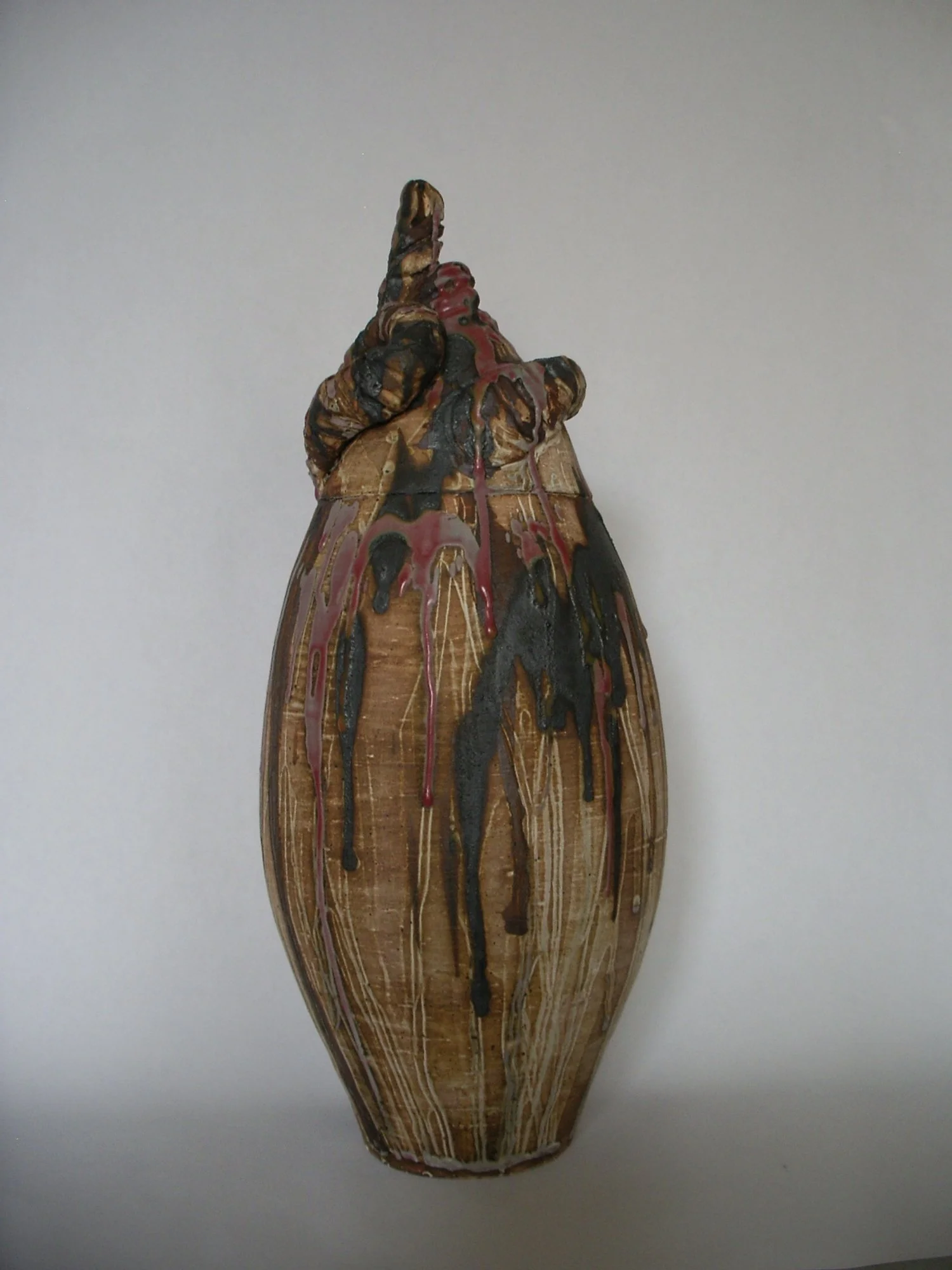 20. Israel Jacinto: por tus tibios brazos curvos que procuran la brisa. 2022. High-fire stoneware with glaze. 15 x 6.5 x 6.5 inch. (38 x 16.51 x 16.51 cm)