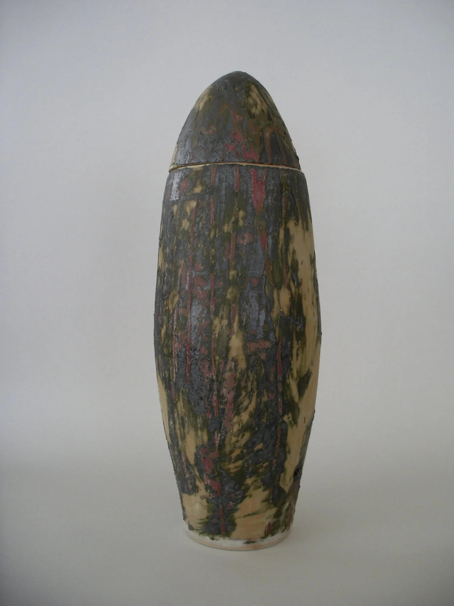 25 Jorge Antonio: por la historia de sal y de conejo que corre por tu cuerpo. 2024. High-fire stoneware with glaze. 15 x 5 x 5 inch. (38 x 12.7 x 12.7 cm)