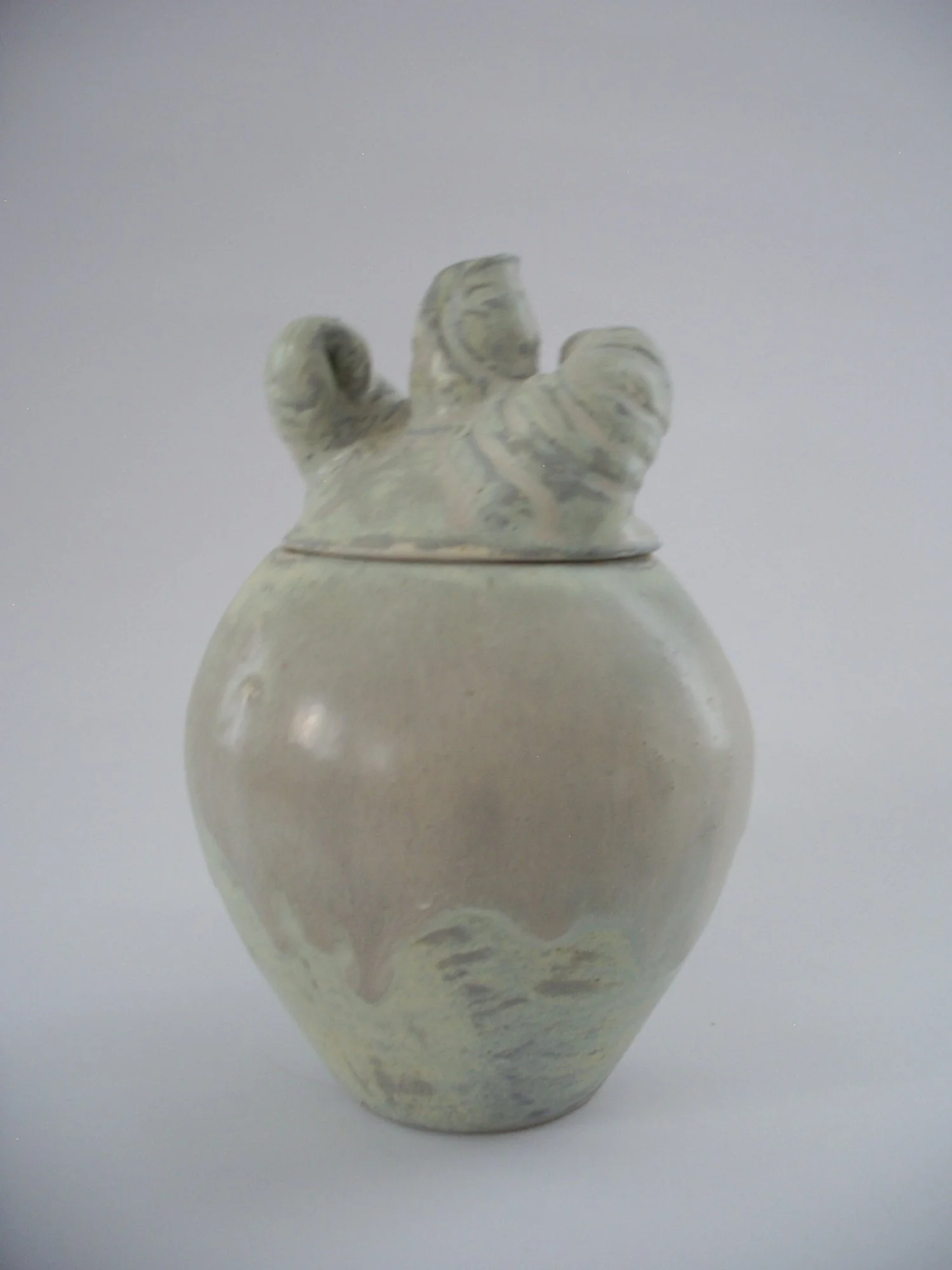 5. Antonio: por tus venas de agujeta de río y tu paso de jaguar de monte. 2014. High-fire stoneware with glaze 6.5 x 4.5 x4.5 (16.51 x 11.43 x 11.43 cm)