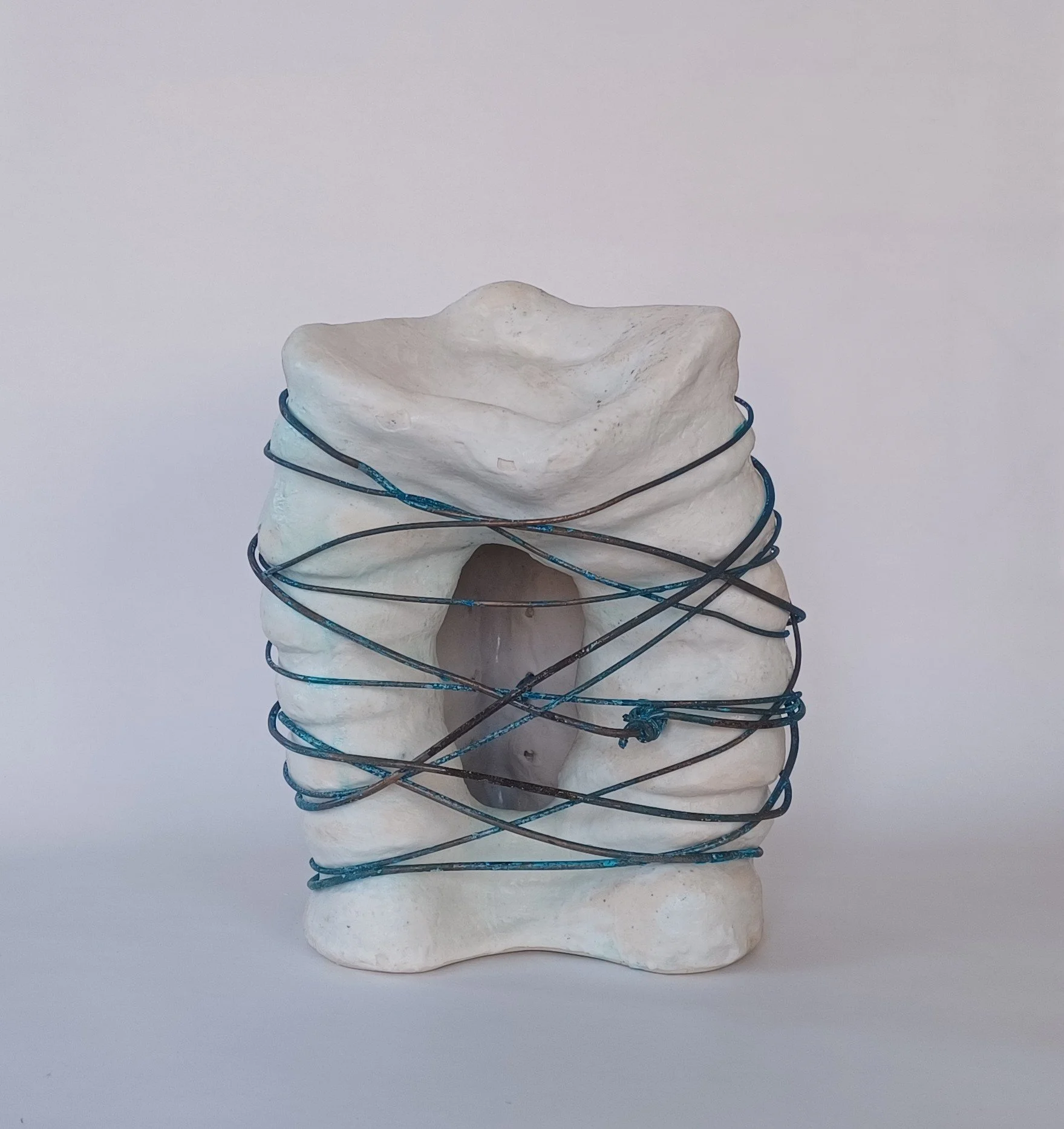 2026. Geno-ecocide 3. Porcelain with glaze and copper wire. 10.5 x 7.5 x 8 inch. (26.67 x 19.05 x 20.32 cm.)