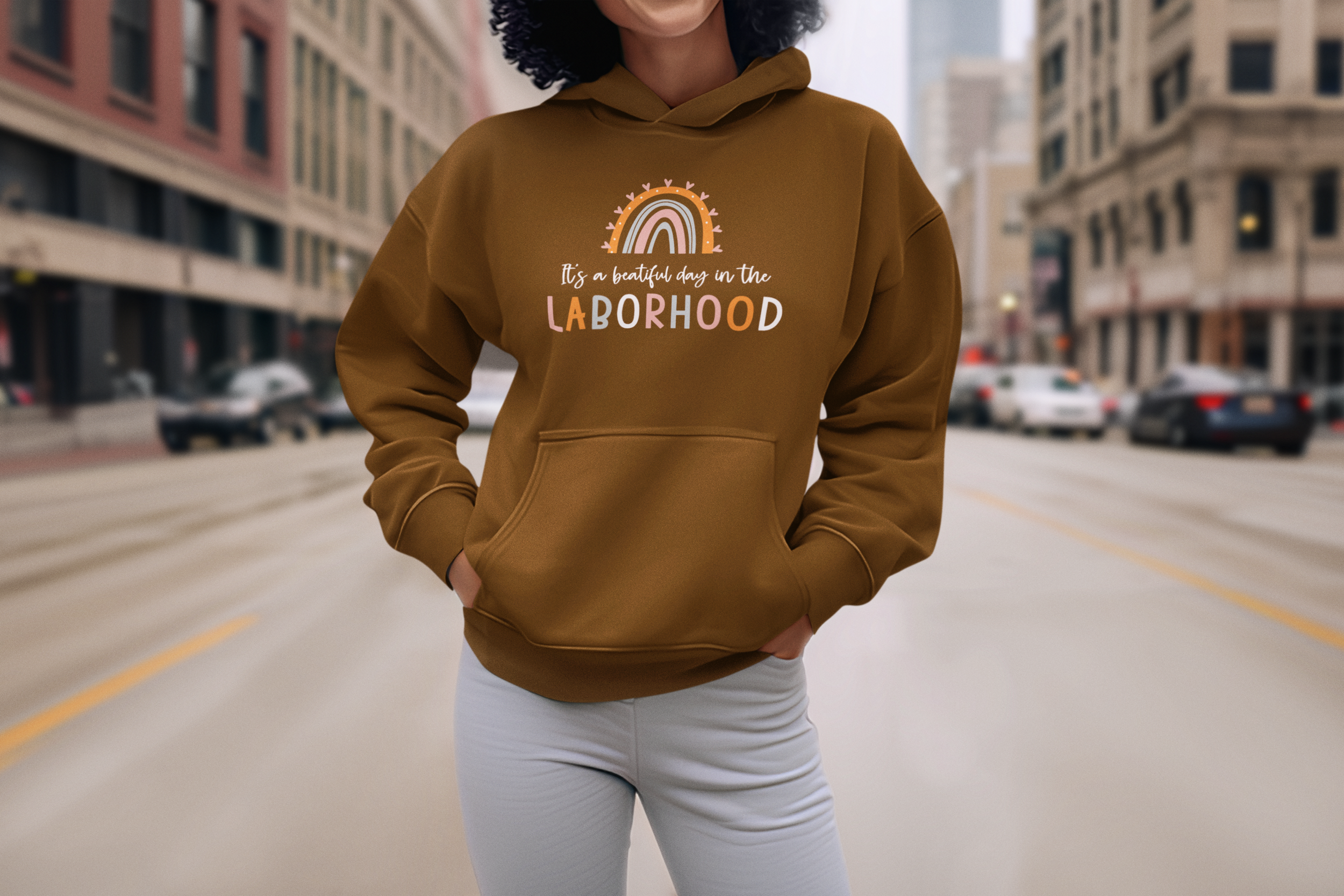 ai-created-mockup-of-a-smiling-woman-with-curly-hair-wearing-a-hoodie-m36033.png