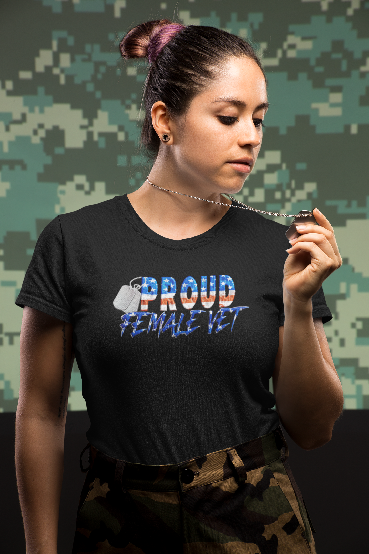 t-shirt-mockup-of-a-veteran-woman-looking-at-her-military-tag-21219.png