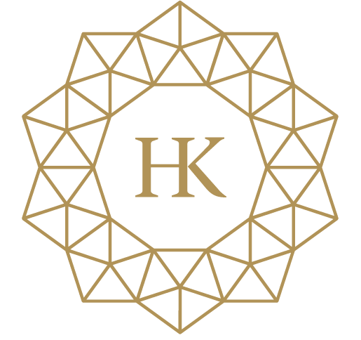 Gold geometric pattern with the initials 'HK' in the center against a black background.