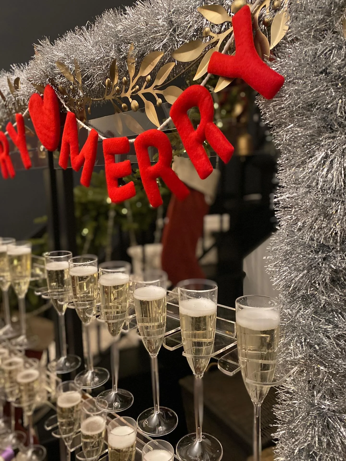 Last night, we were honored to attend a gorgeous holiday party, where we helped guests create special personalized leather bookmarks, ornaments, and journal covers!

Creativity was flowing, the shot tree was slowly losing its cocktail filled ornament