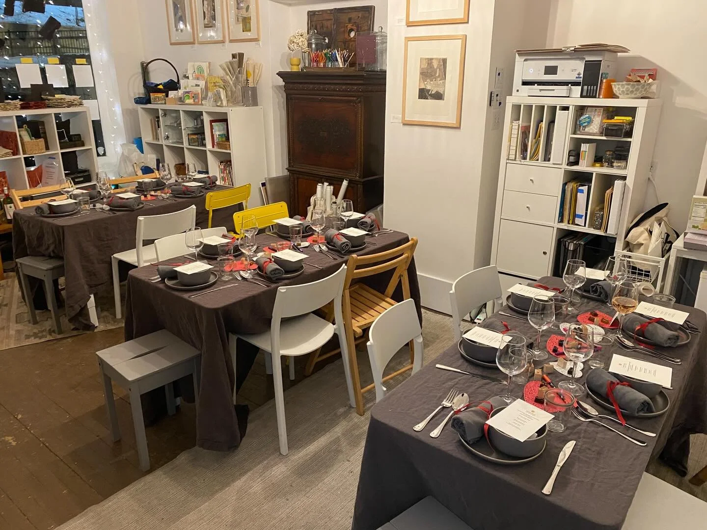 Once a month, on the second Monday of the month, we transform our space into a bistro, separating our bindery tables and adding place settings with menus and wine glasses. 

Eat Their Words is one of our more popular programs, often selling out. 

La