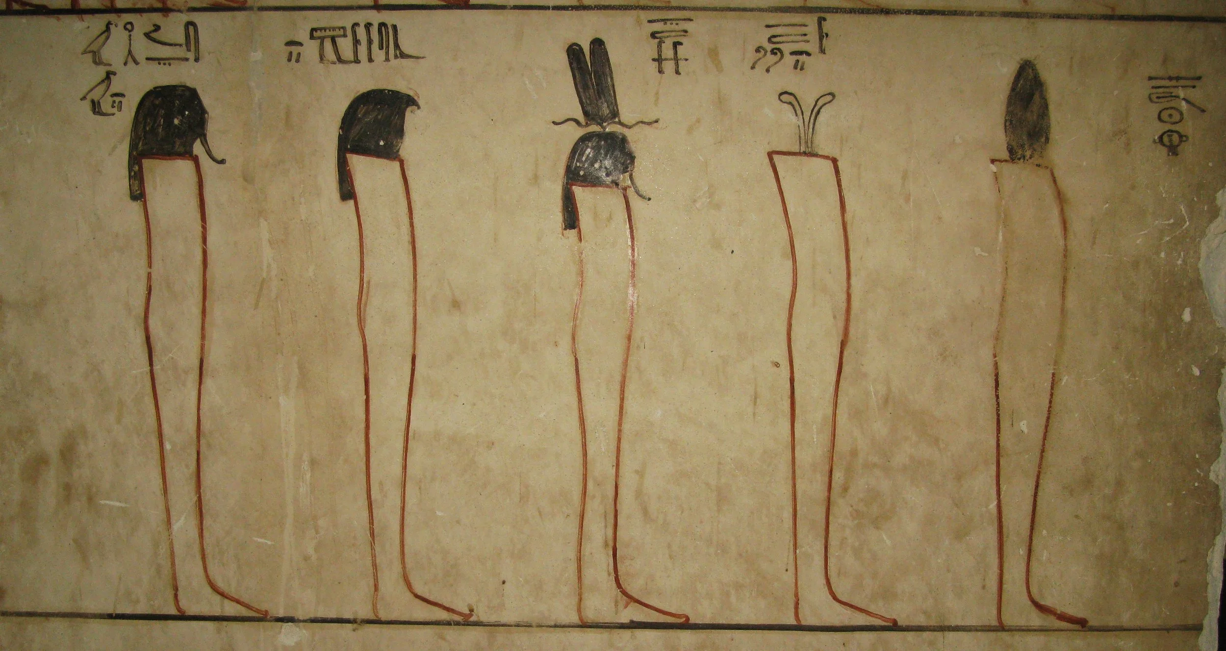 Ancient Egyptian painting of five mummiform gods.