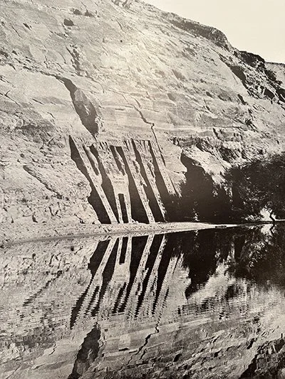 Black and white photograph of the facade of the temple of Nefertari at Abu Simbel.