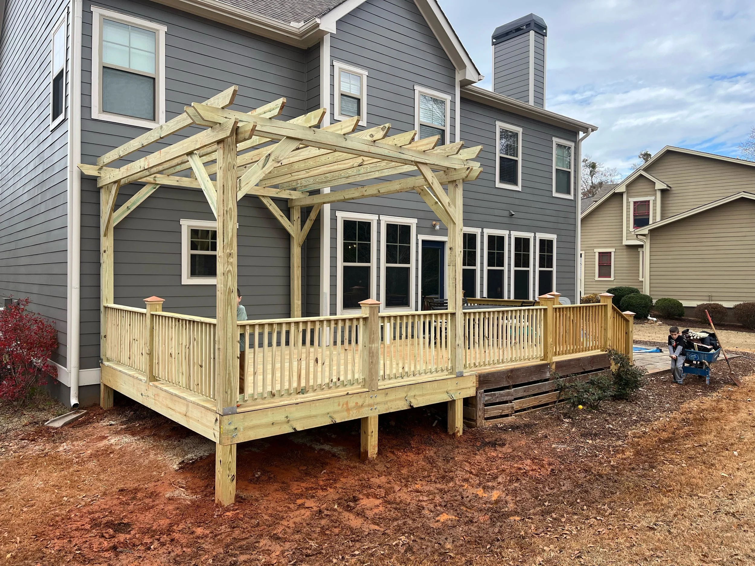 Deck addition with pergola