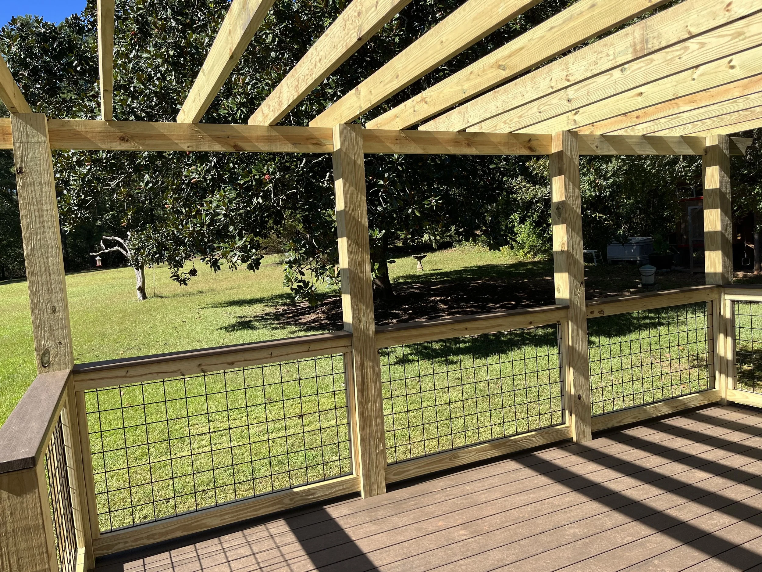 Hog wire handrails, composite decking