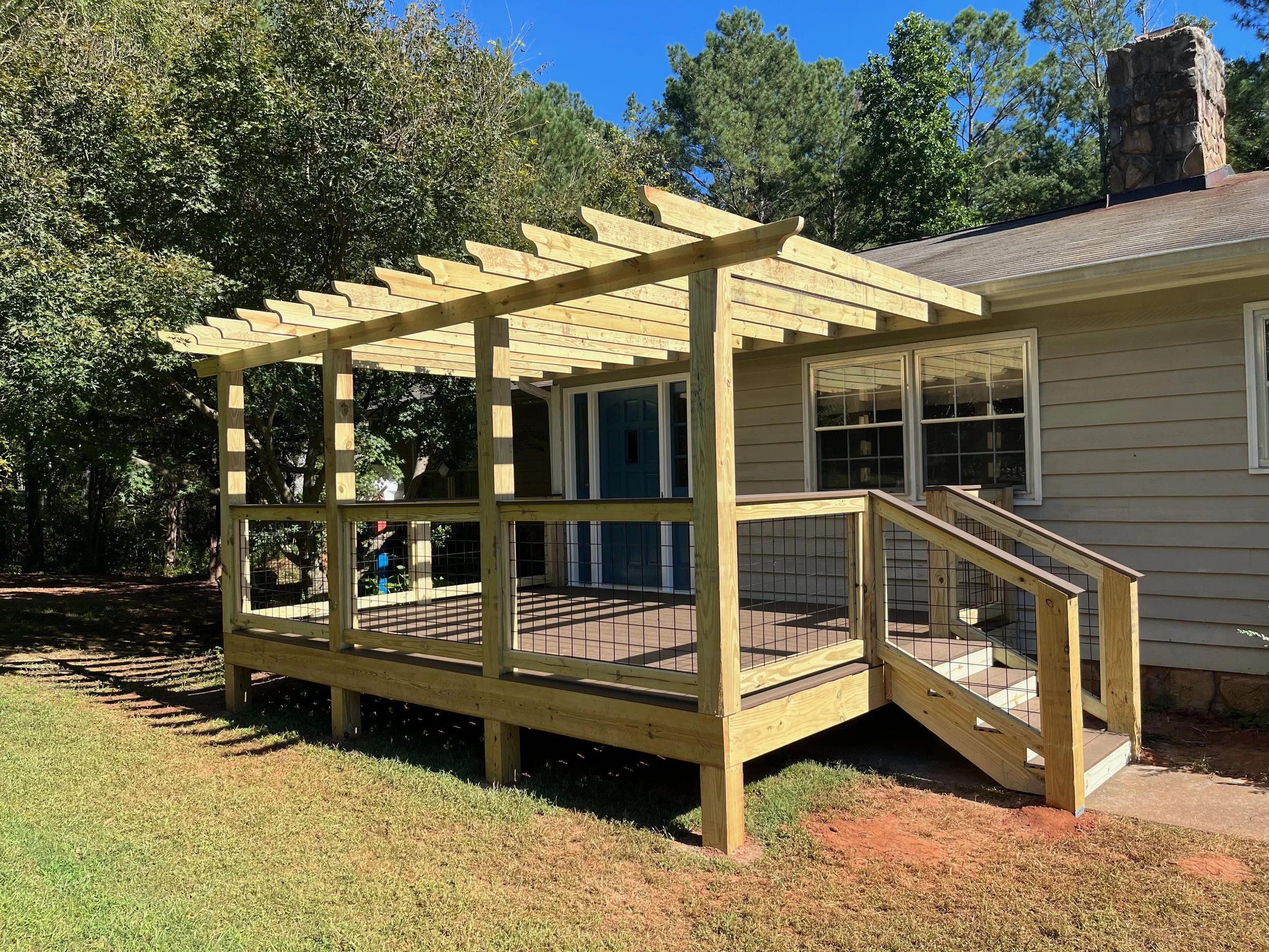 Composite deck with pergola