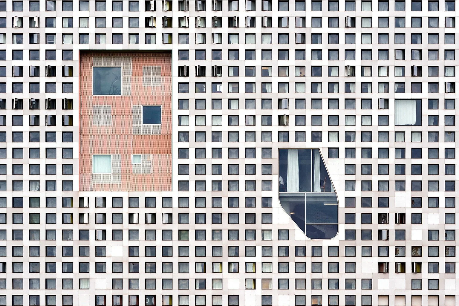 Detail of the perforated façade of MIT’s Simmons Hall in Cambridge, Massachusetts.