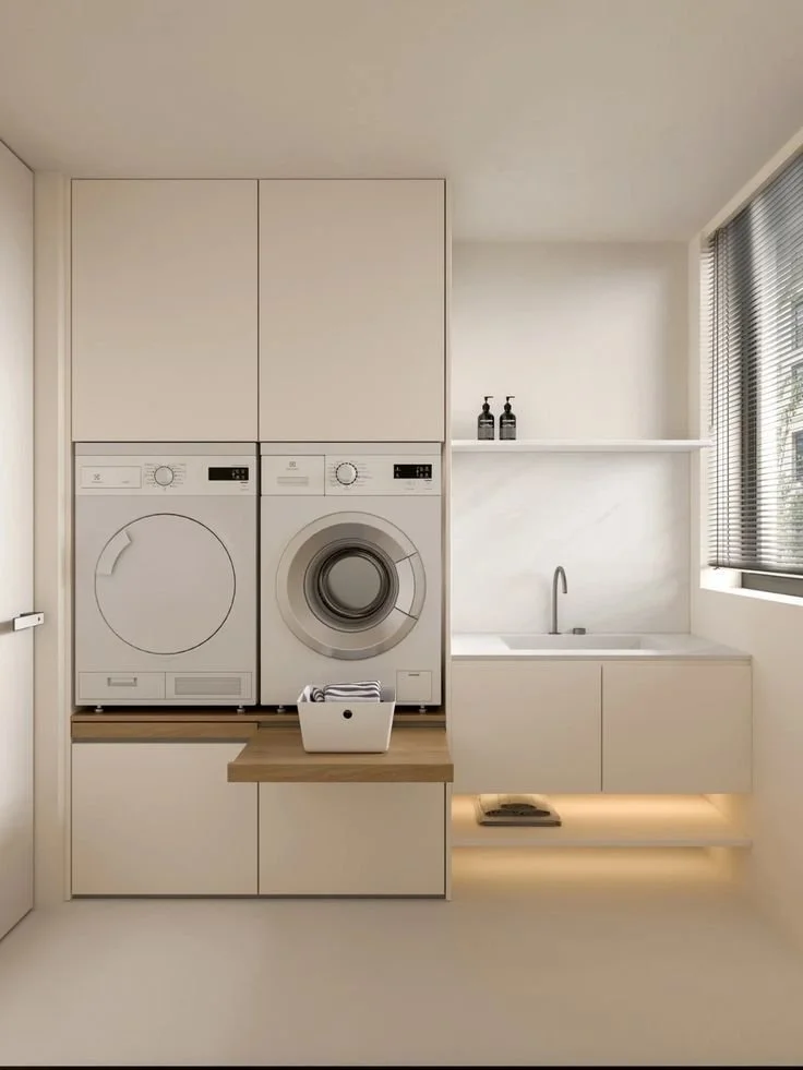 Foto de referencia de tina tipo fregador y lavadoras en mueble alto contínuo