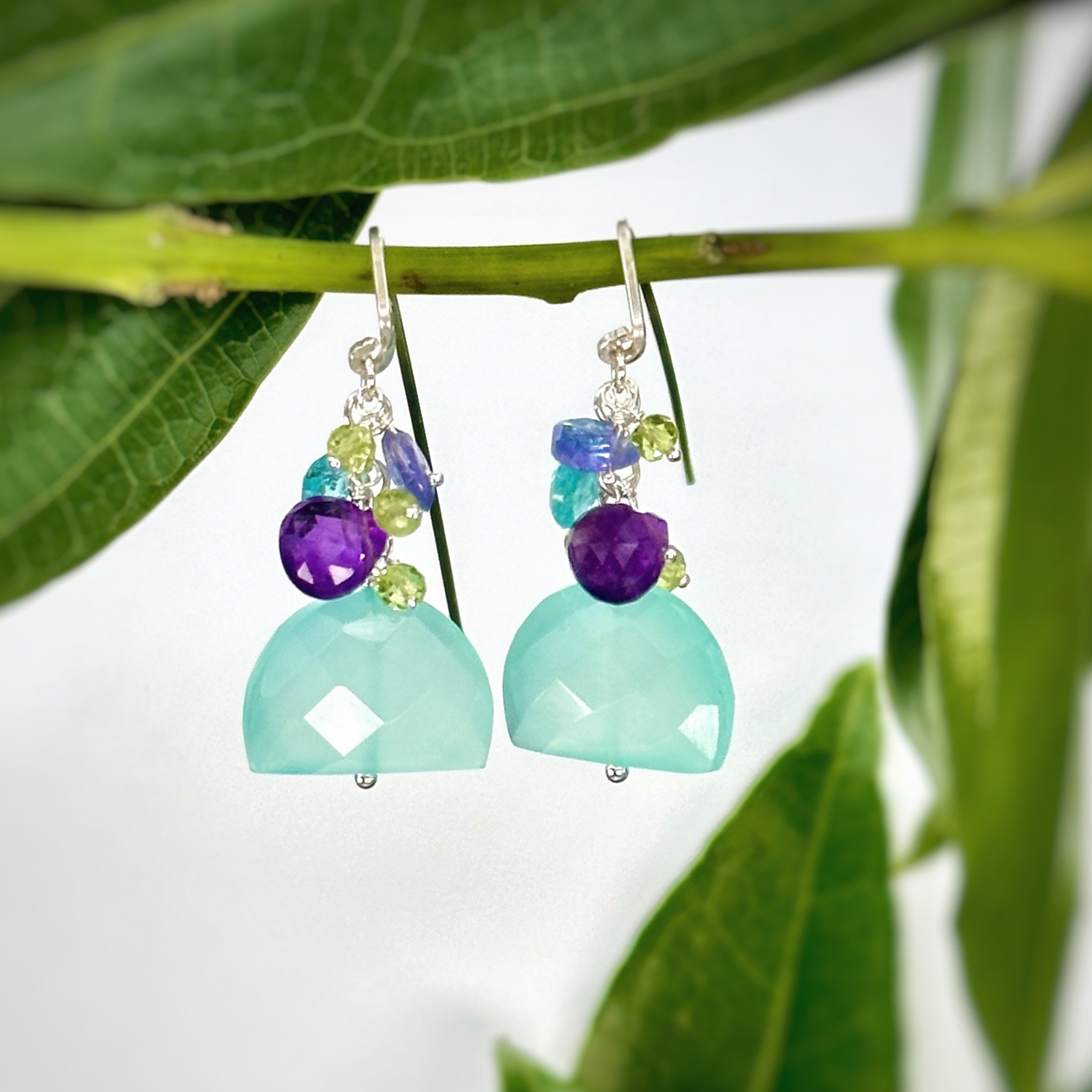 🌸The Orchid Earrings! 

A dazzling pair of earrings with aqua chalcedony + purple amethyst + tanzanite + peridot! 

This pair of earrings, a pair of sunnies, jeans, a crisp white shirt and a sassy jacket, sandals and you are ready for a night out th