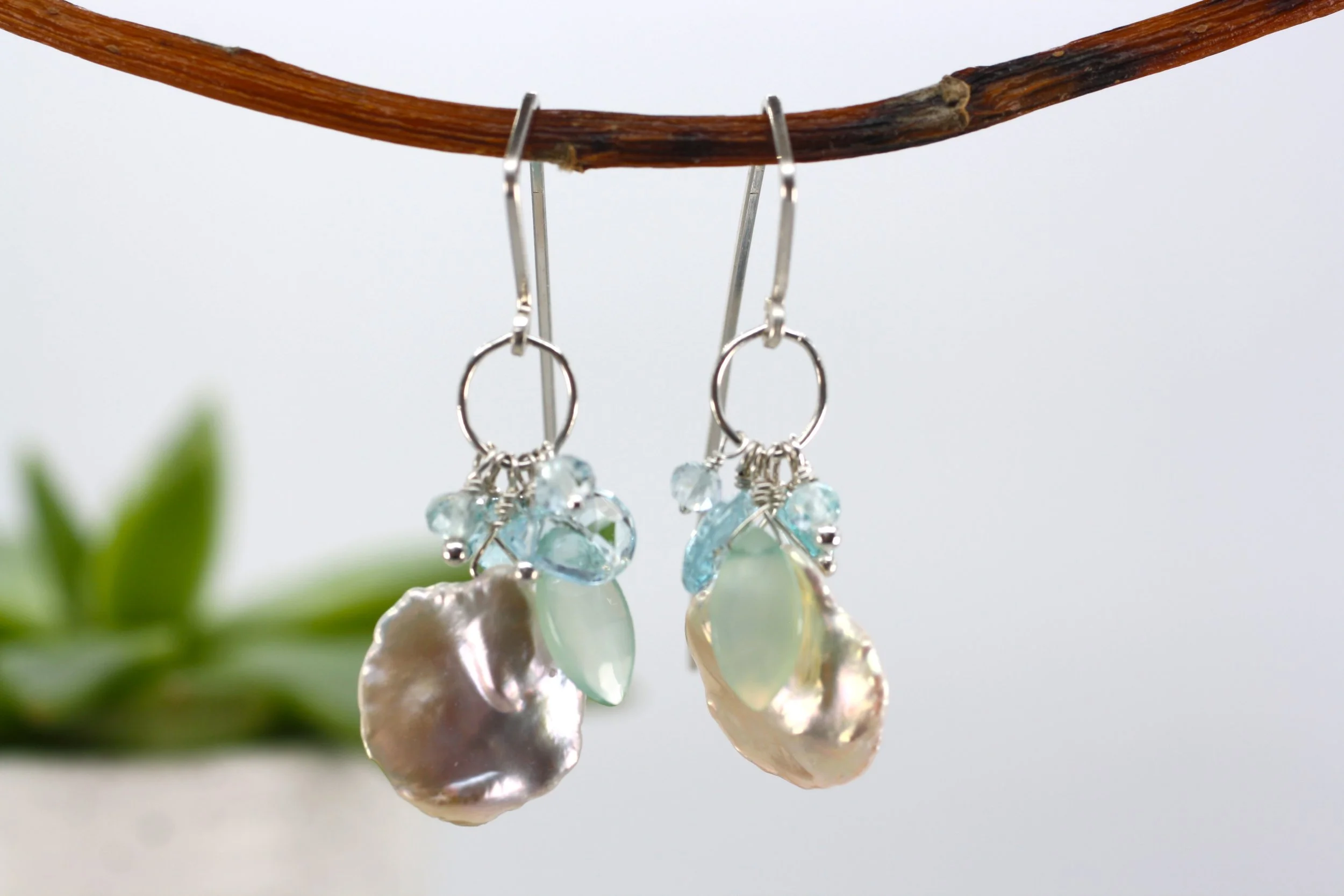 Studio Earrings Petal Pearl aqua chal loop hanging.JPG