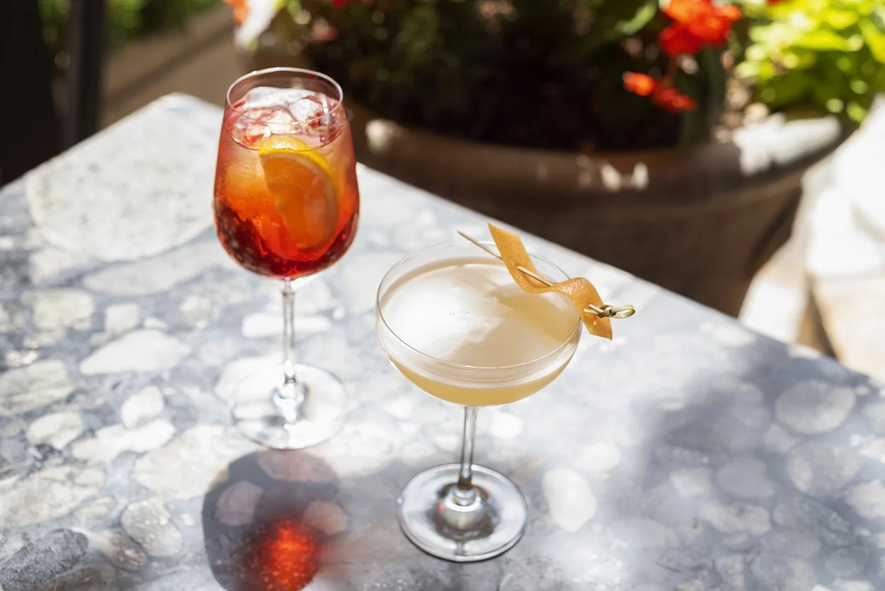 05-outdoor-cocktails-aperol-spritz-coupe-marble-table.jpg