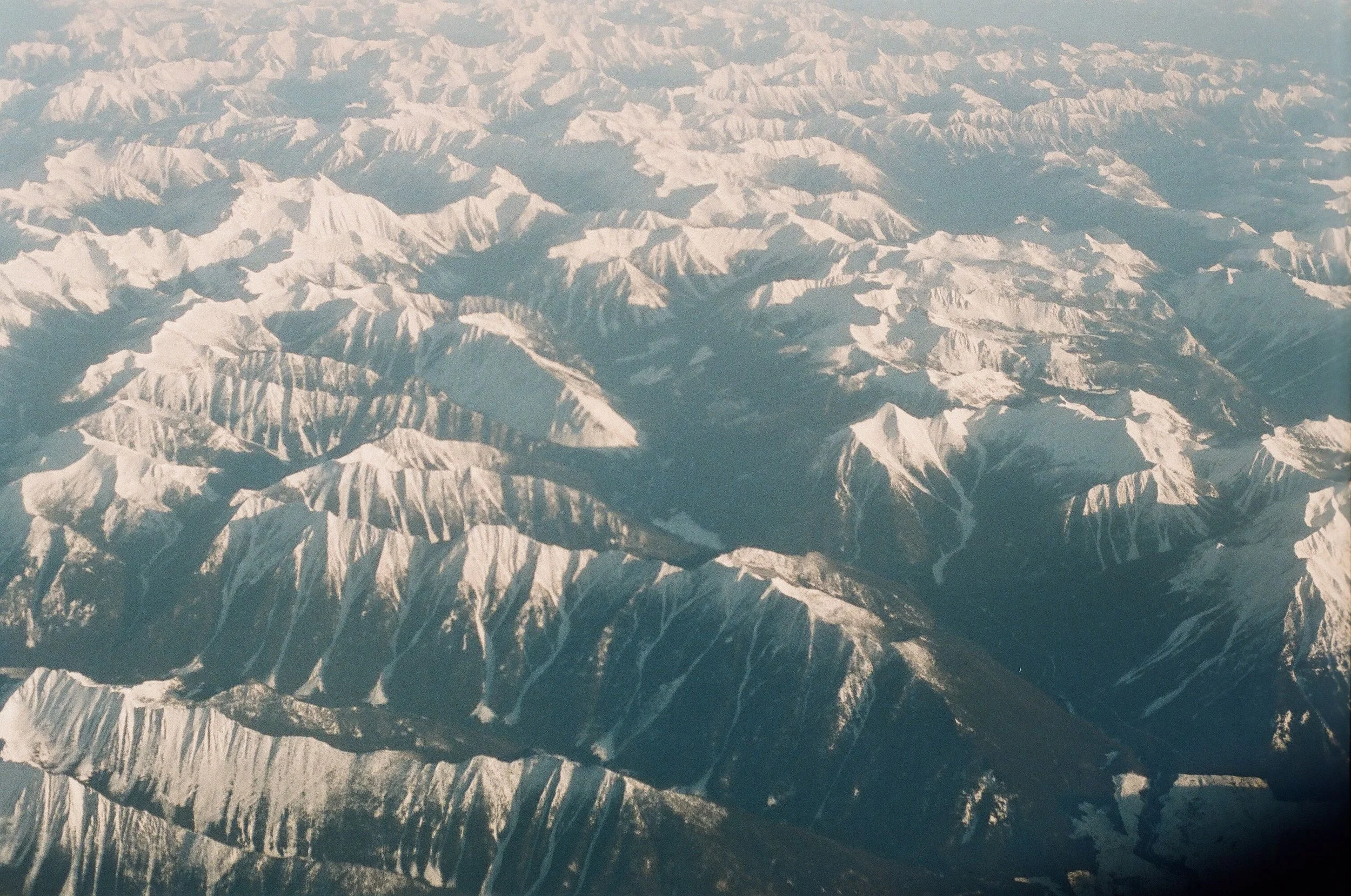 15-canadian-rockies-aerial-snow-peaks-film.jpg