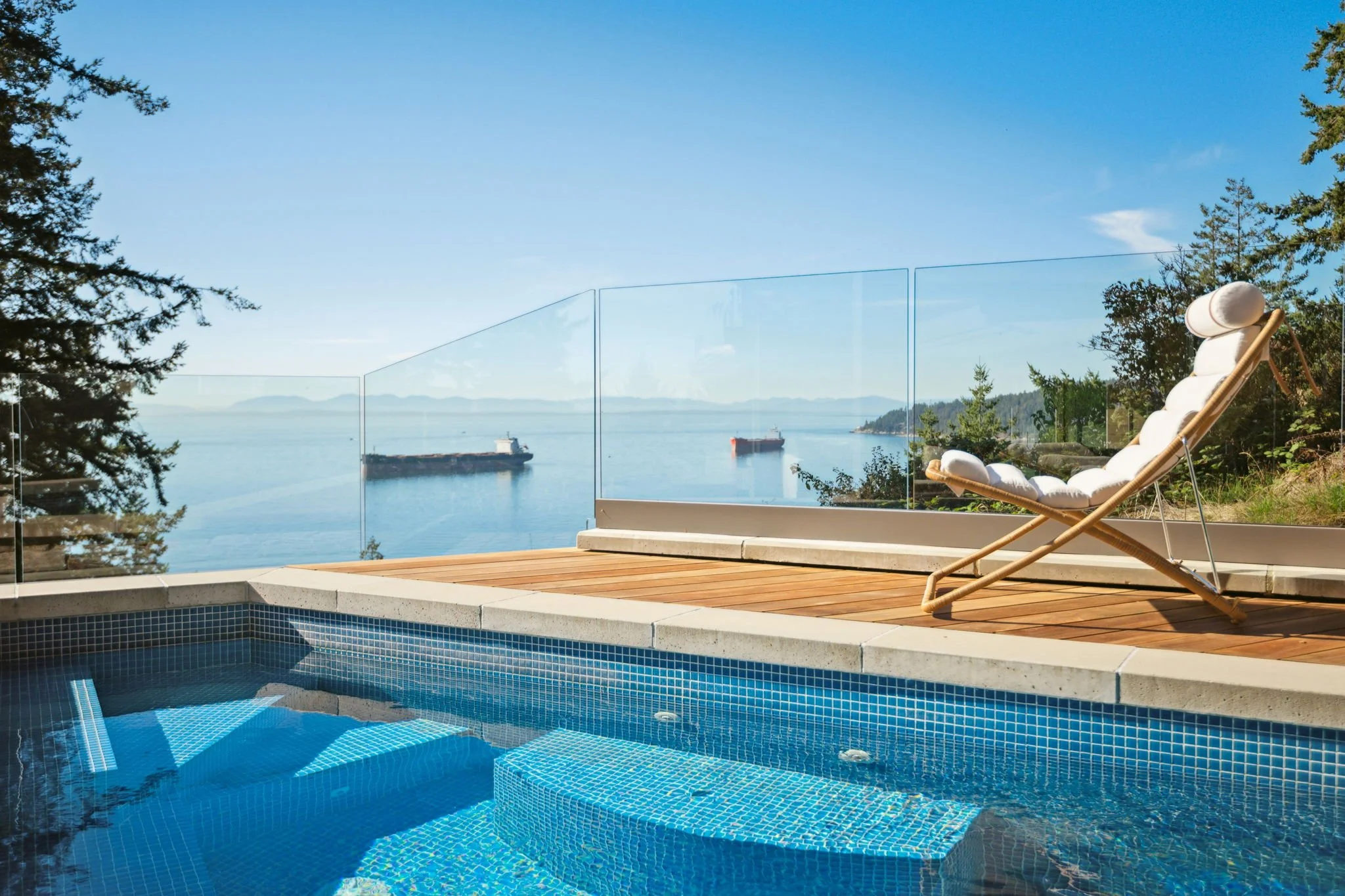 west-vancouver-waterfront-estate-pool-lounge-chairs-ocean-view.jpg
