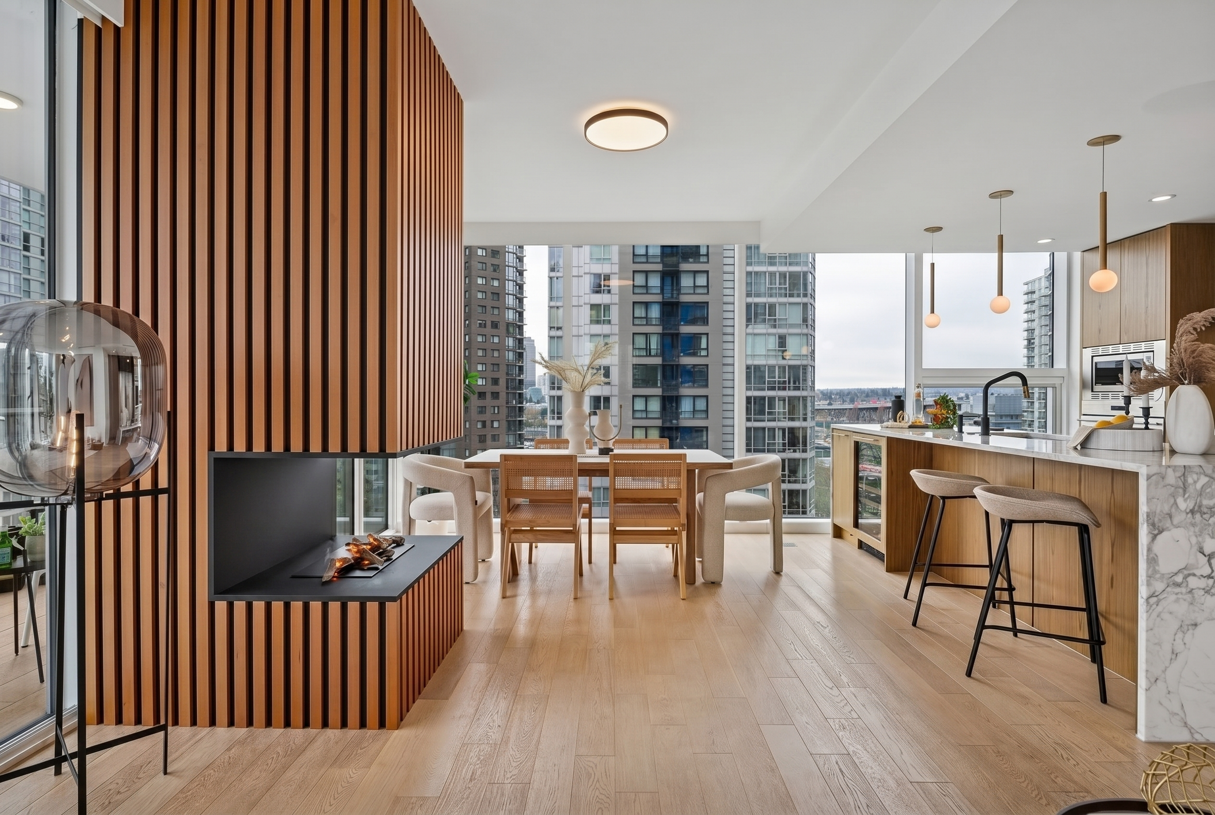 yaletown-home-open-plan-living-dining-kitchen-city-view.png