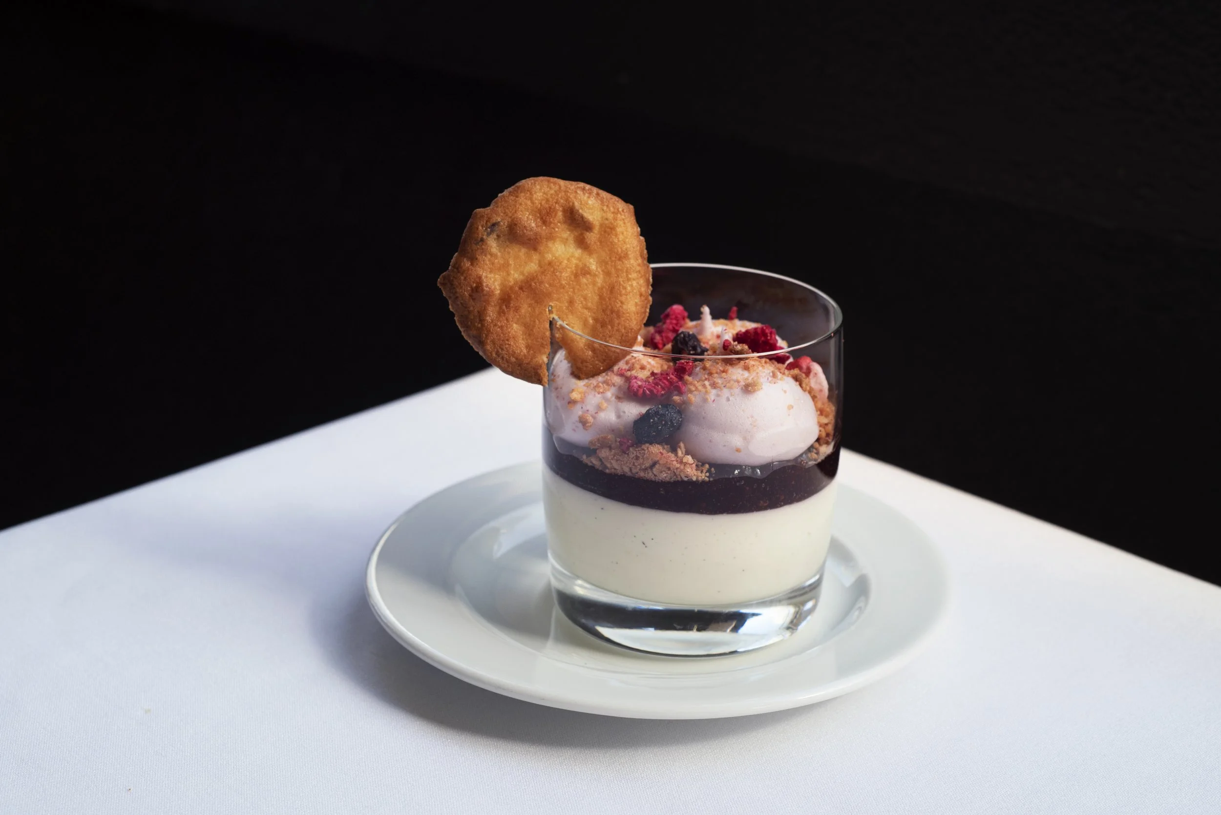 14-fine-dining-panna-cotta-berry-compote-dark.jpg