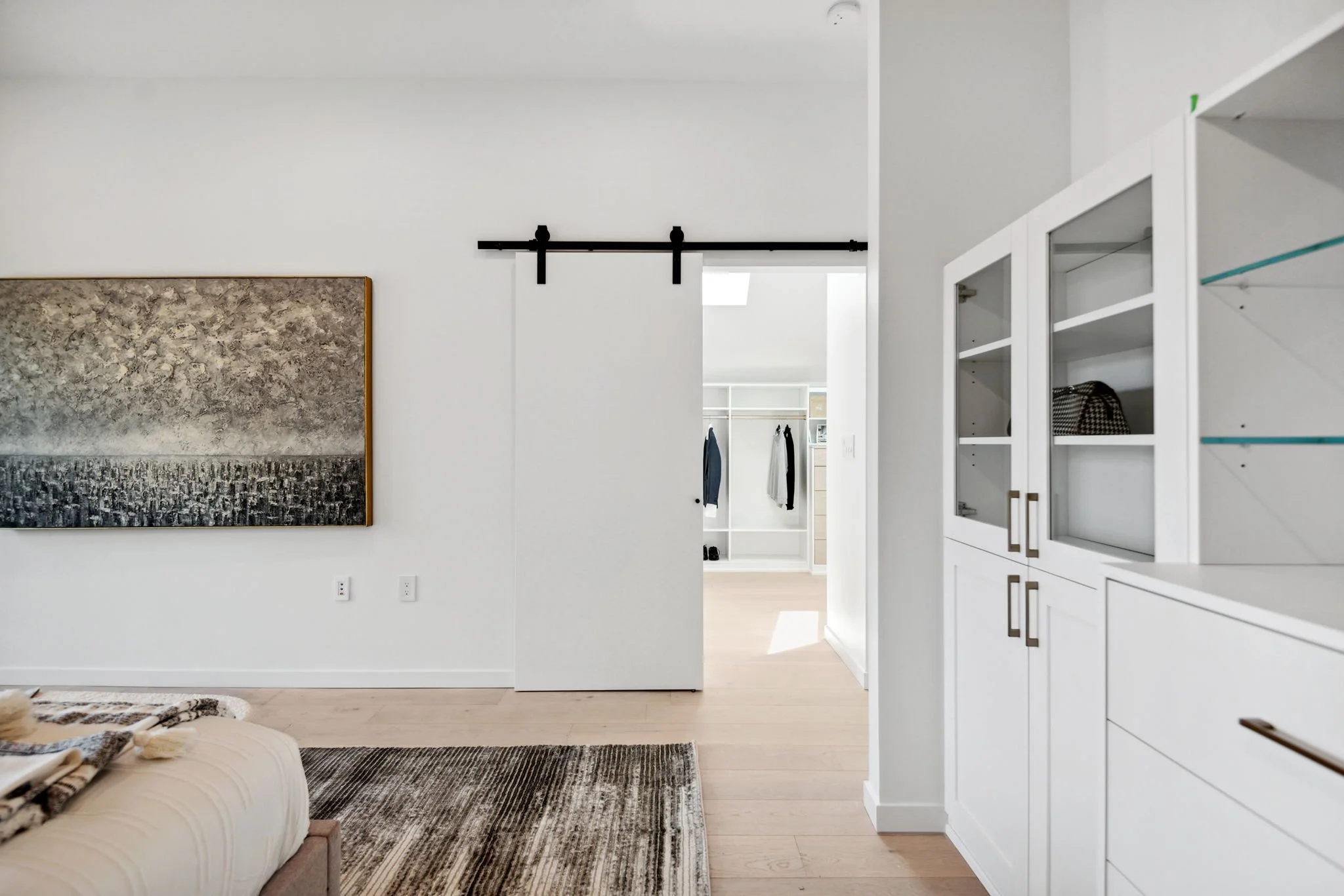 kerrisdale-home-master-bedroom-barn-door-walk-in-closet.jpg